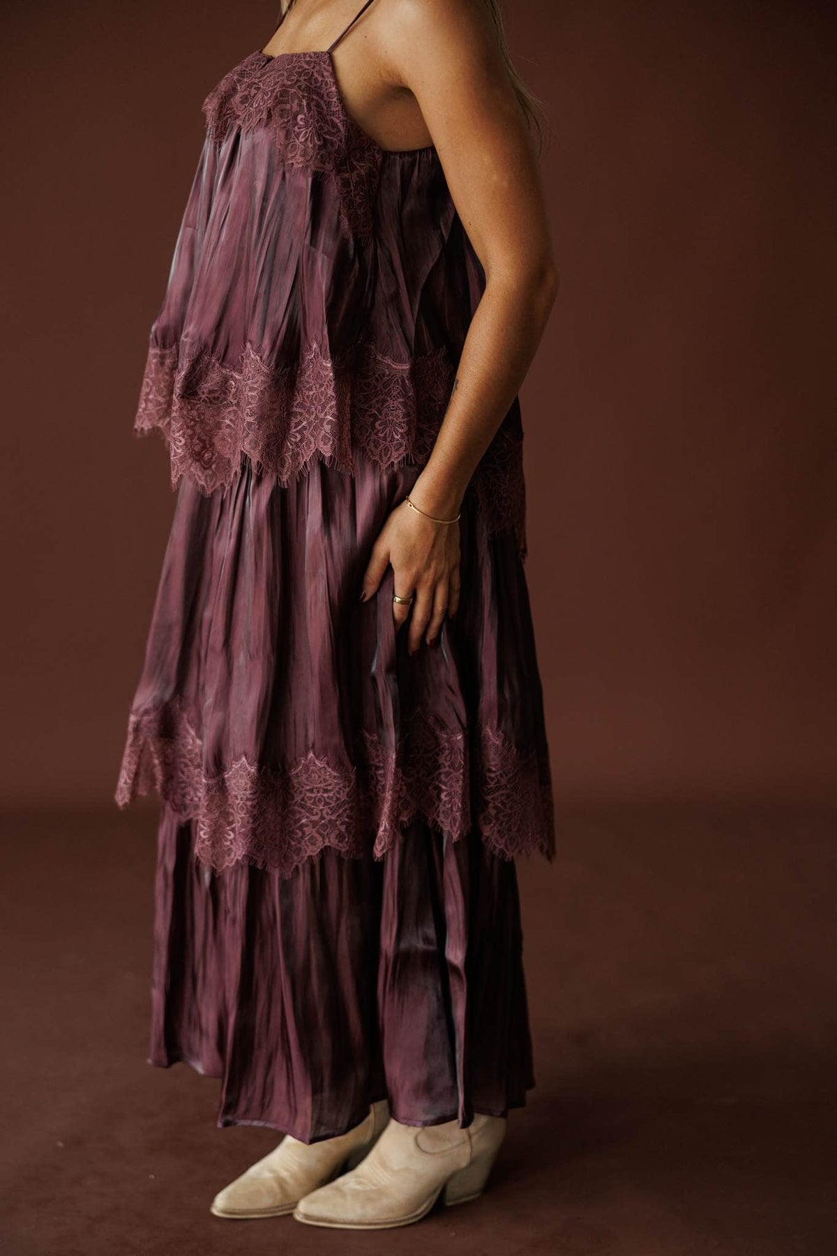 Where The Wildflowers Grow Maxi Dress in plum, side view of the tiered lace panels