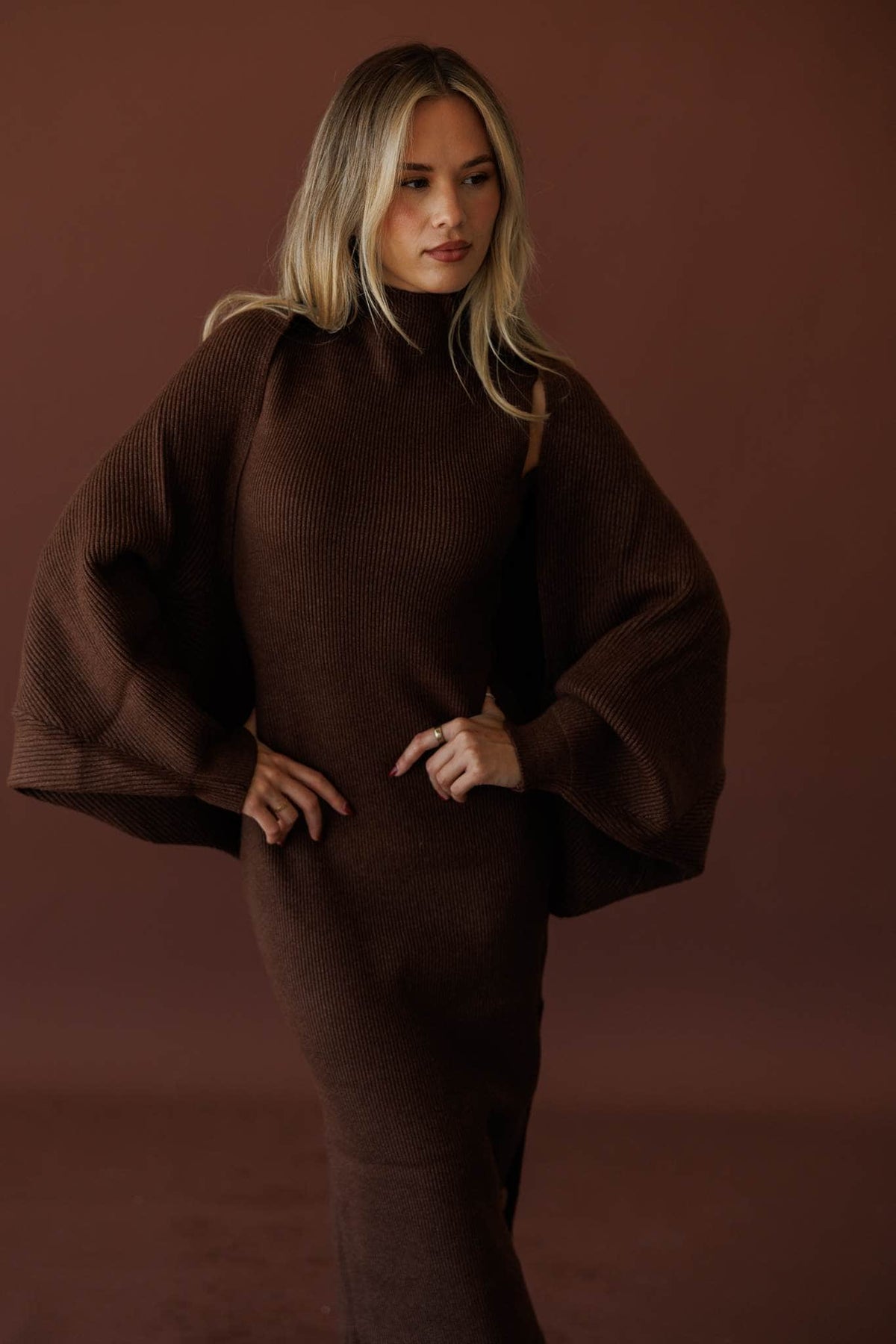 Serving Looks Shrug, in chocolate, front view of the ribbed shrug