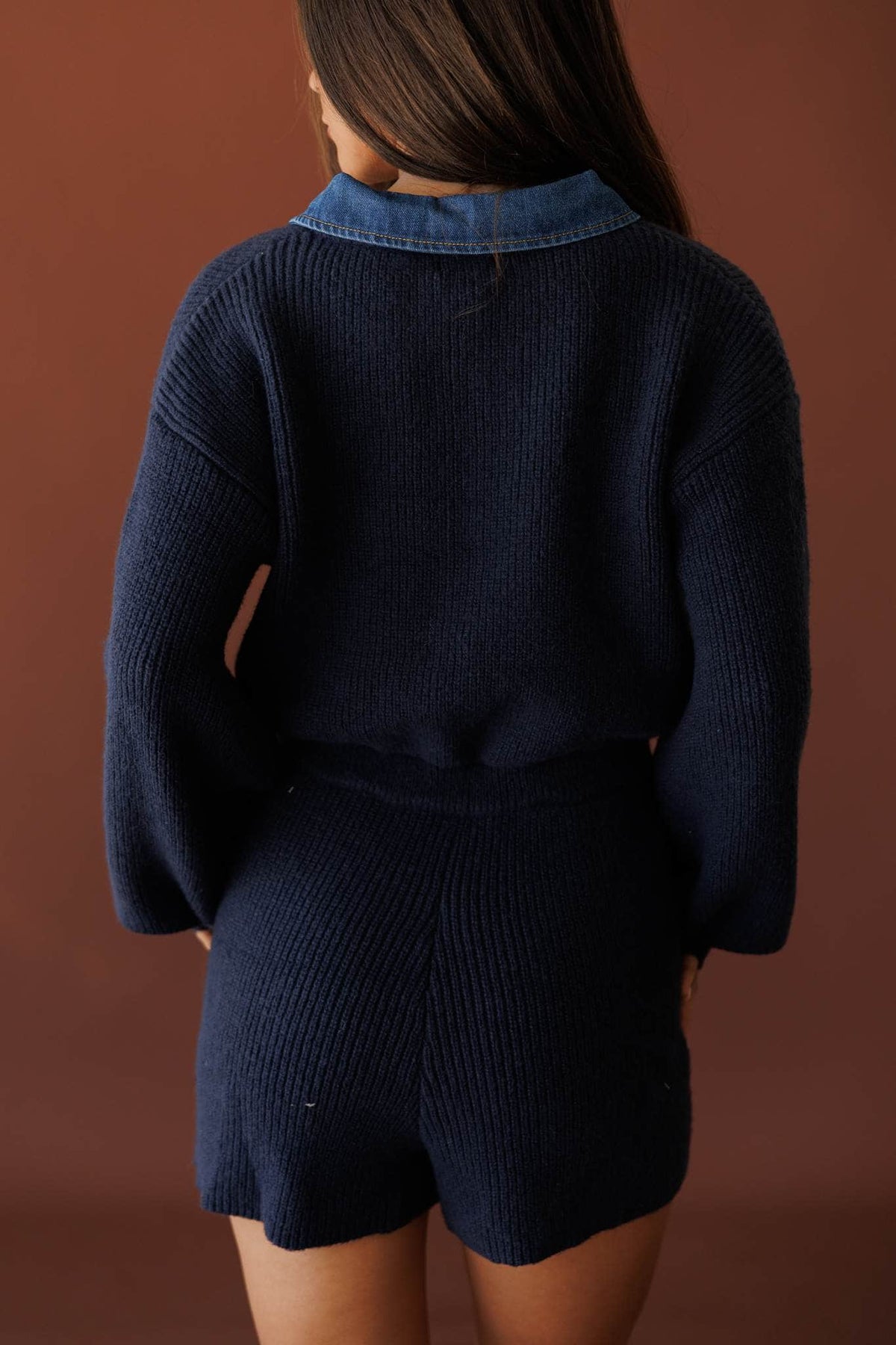 Mixed Signals Sweater Romper, in midnight, back view of the knit romper