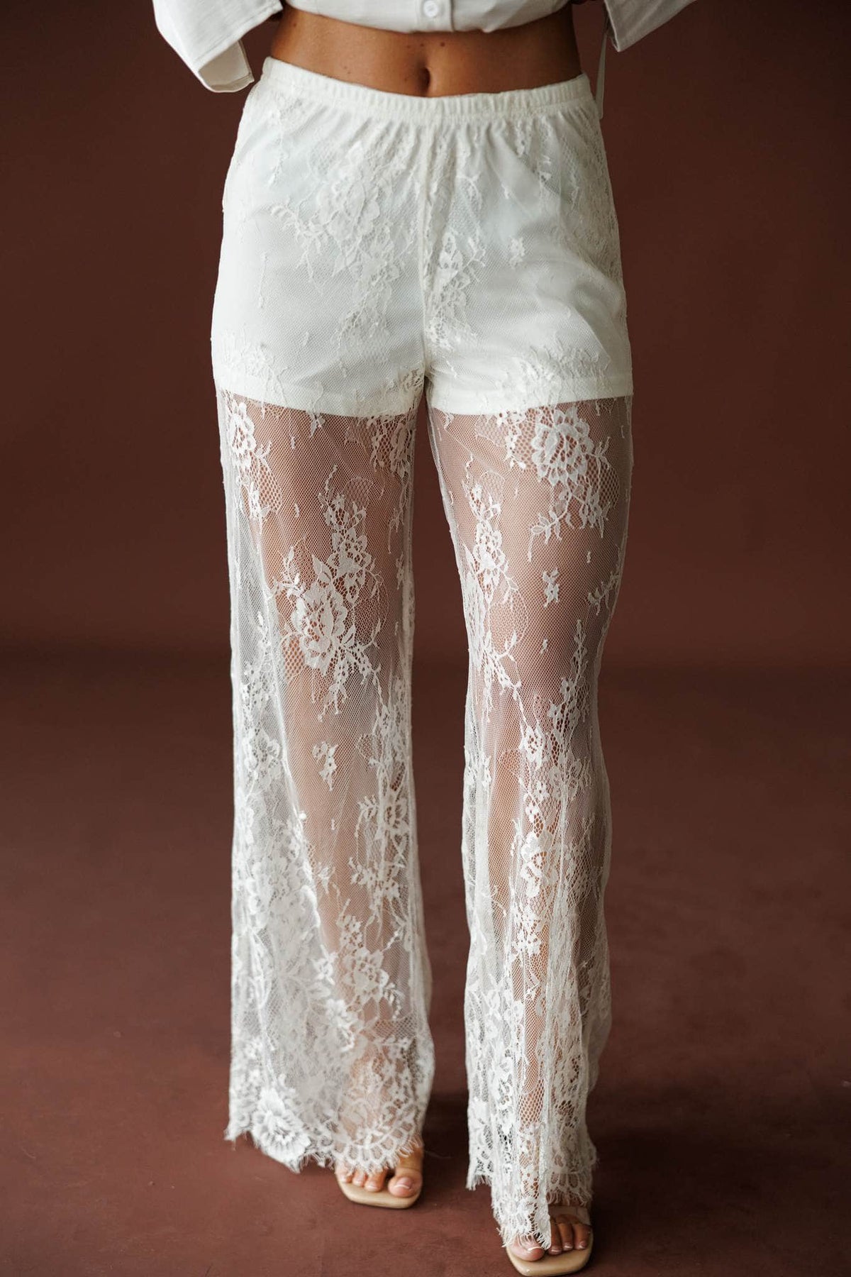 Lace Getaway Pants in champagne, front close-up of the sheer lace and lined short