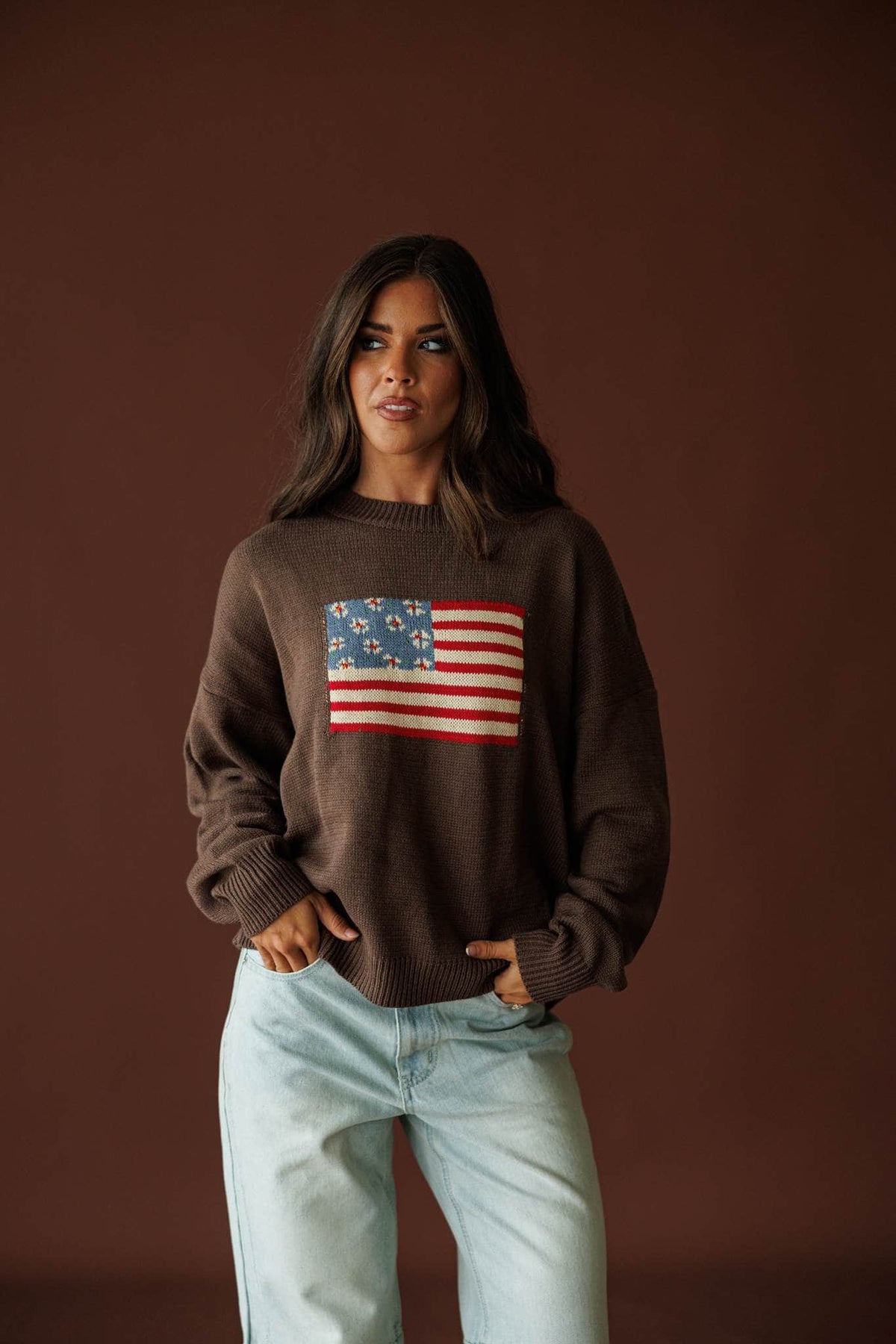 Homegrown Flag Sweater in cocoa, full-length view with light wash jeans