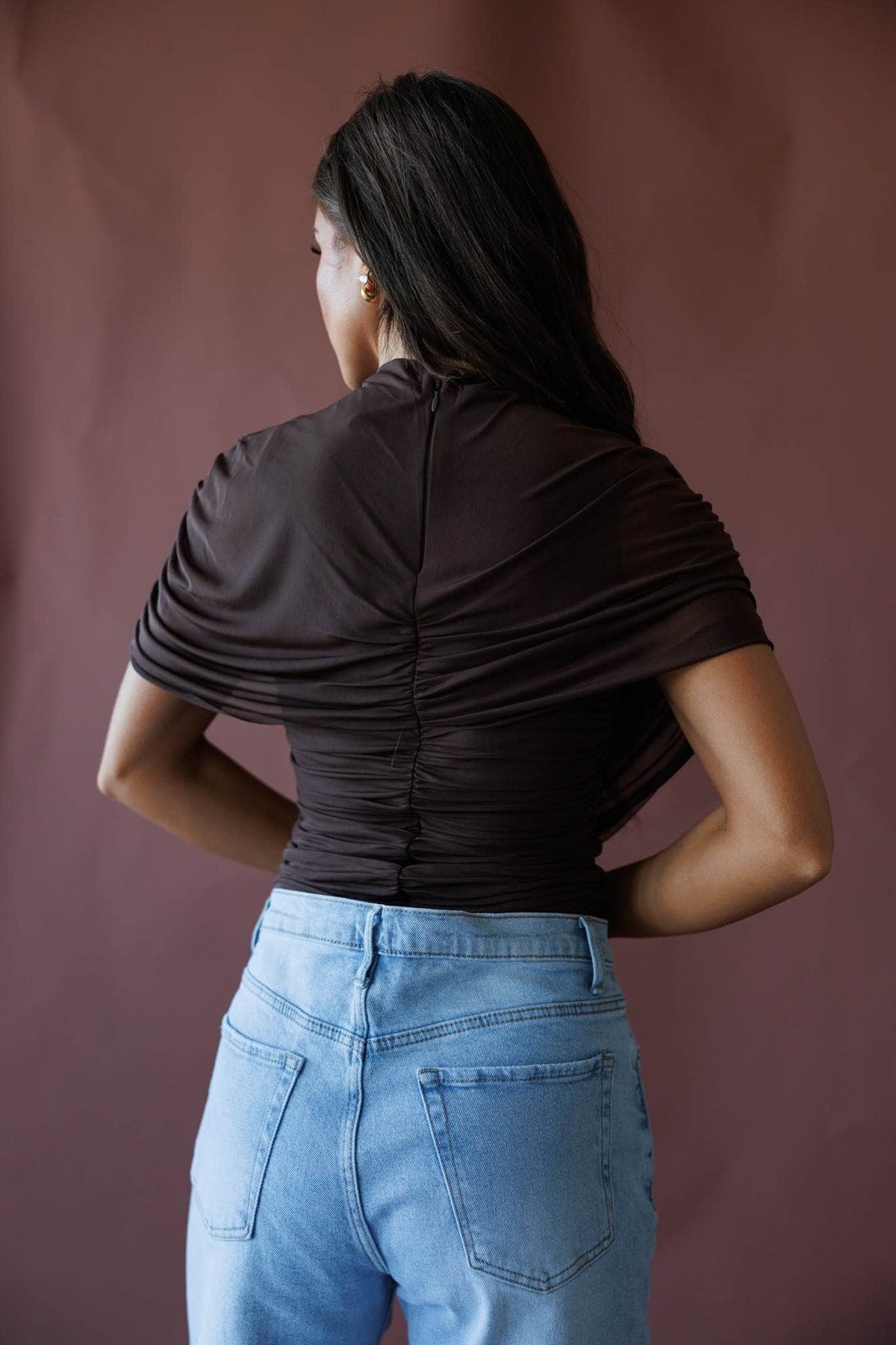 Brown draped asymmetric cape top