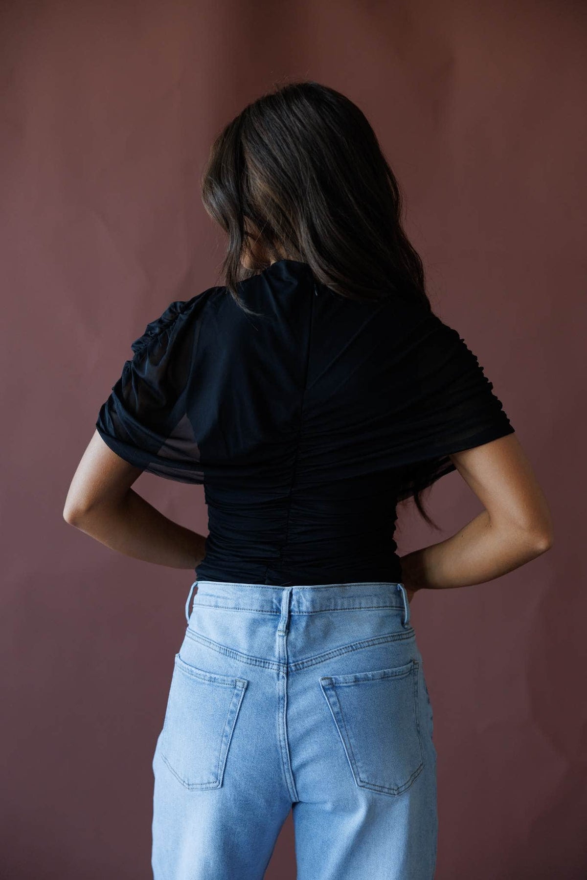 Brown draped asymmetric cape top