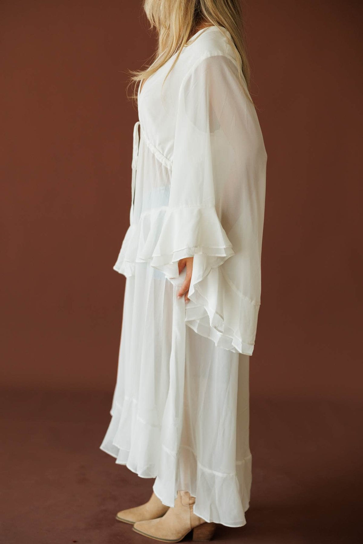 Desert Angel Duster in cream, side view showing the sheer bell sleeve