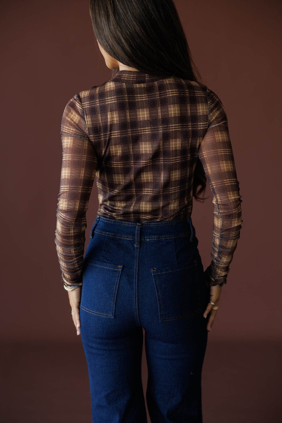 Bookmarked Plaid Mesh Bodysuit in brown and butter, back view showing the fitted plaid mesh