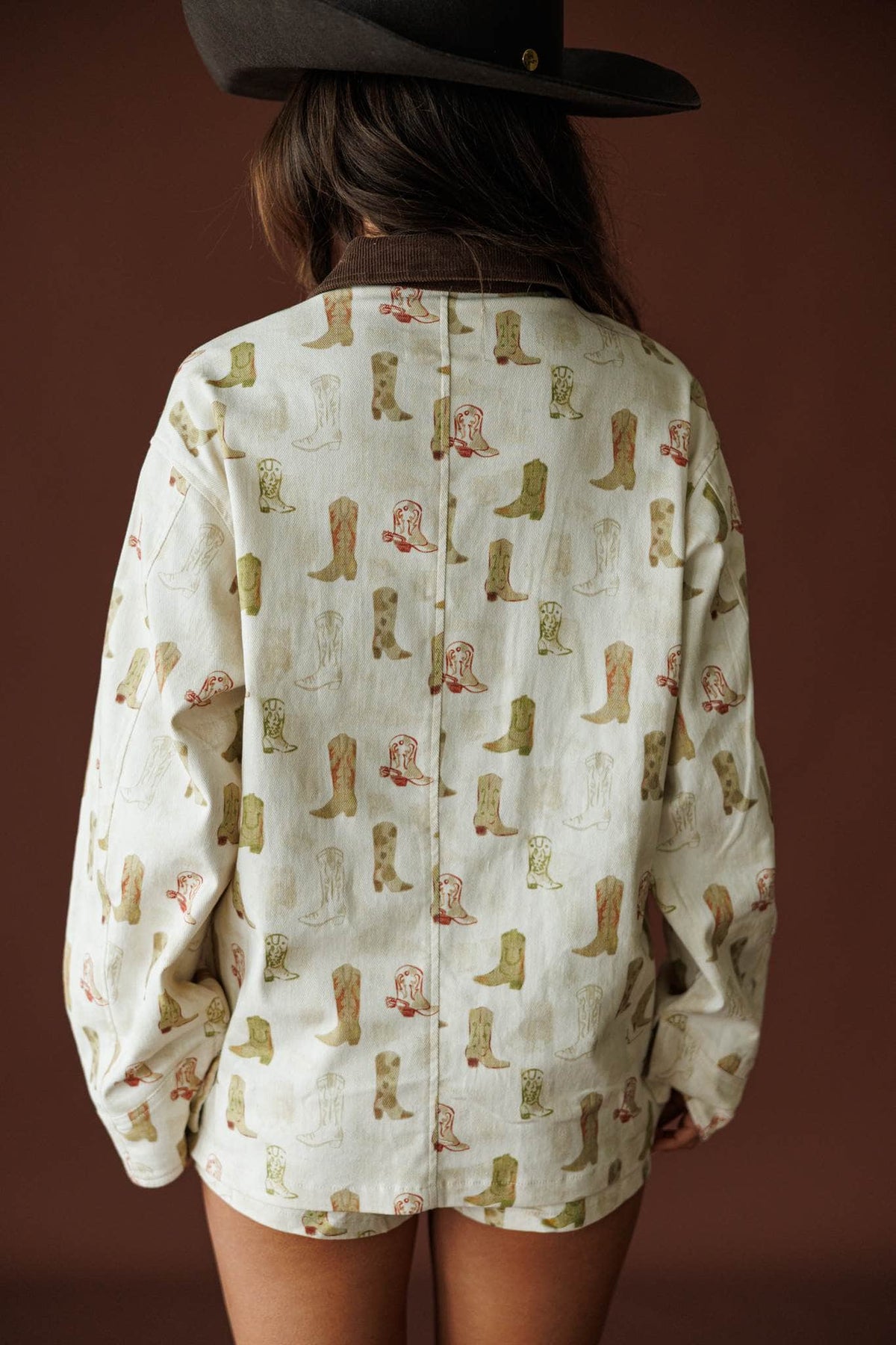 Boot Scootin' Shacket in oat, back view showing the oversized boot print shacket