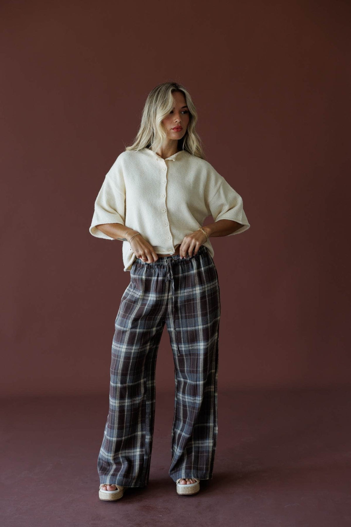 Brown Plaid Boxer Pants in brown, full-length view on a studio backdrop