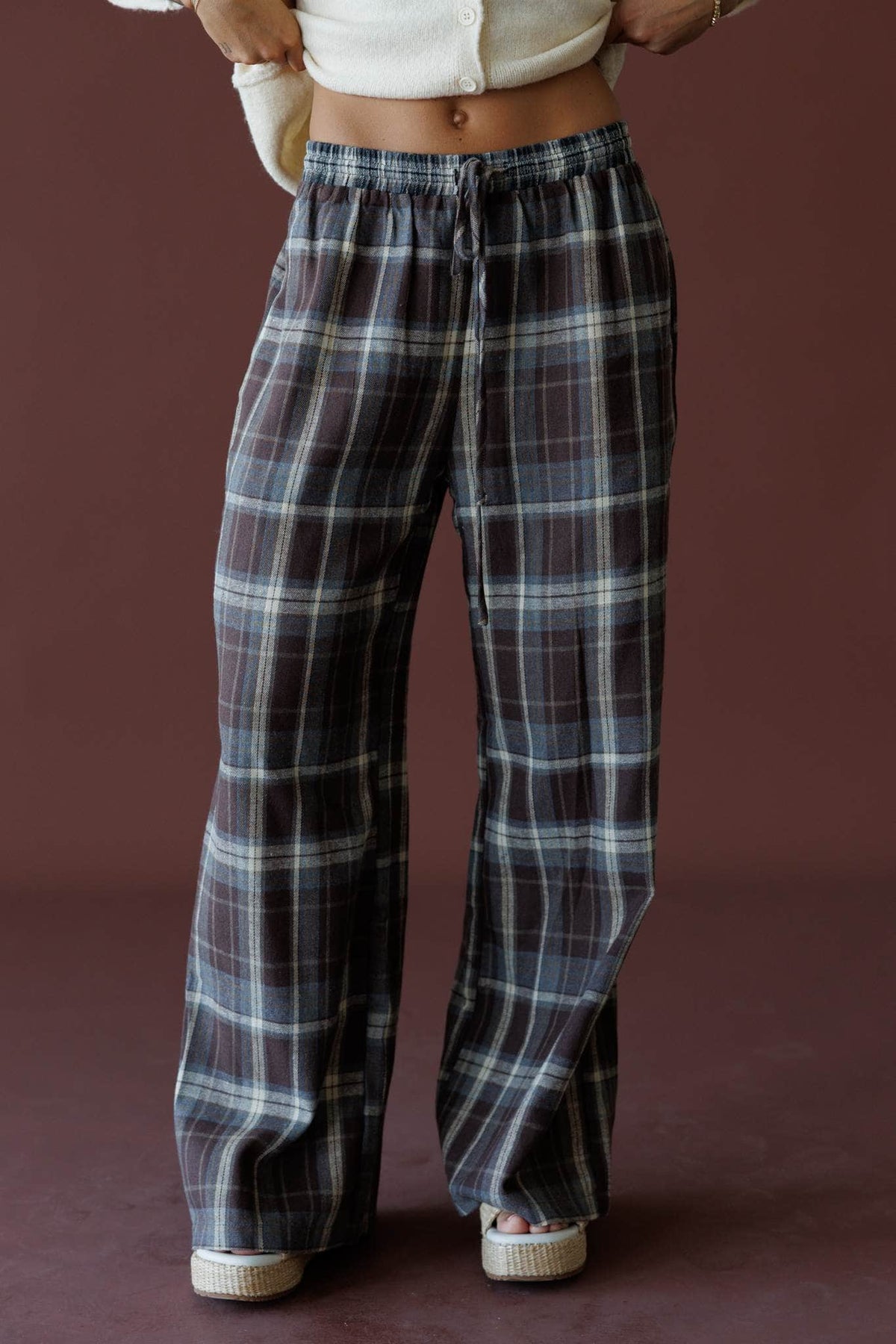 Brown Plaid Boxer Pants in brown, front close-up of the elastic waist plaid pants