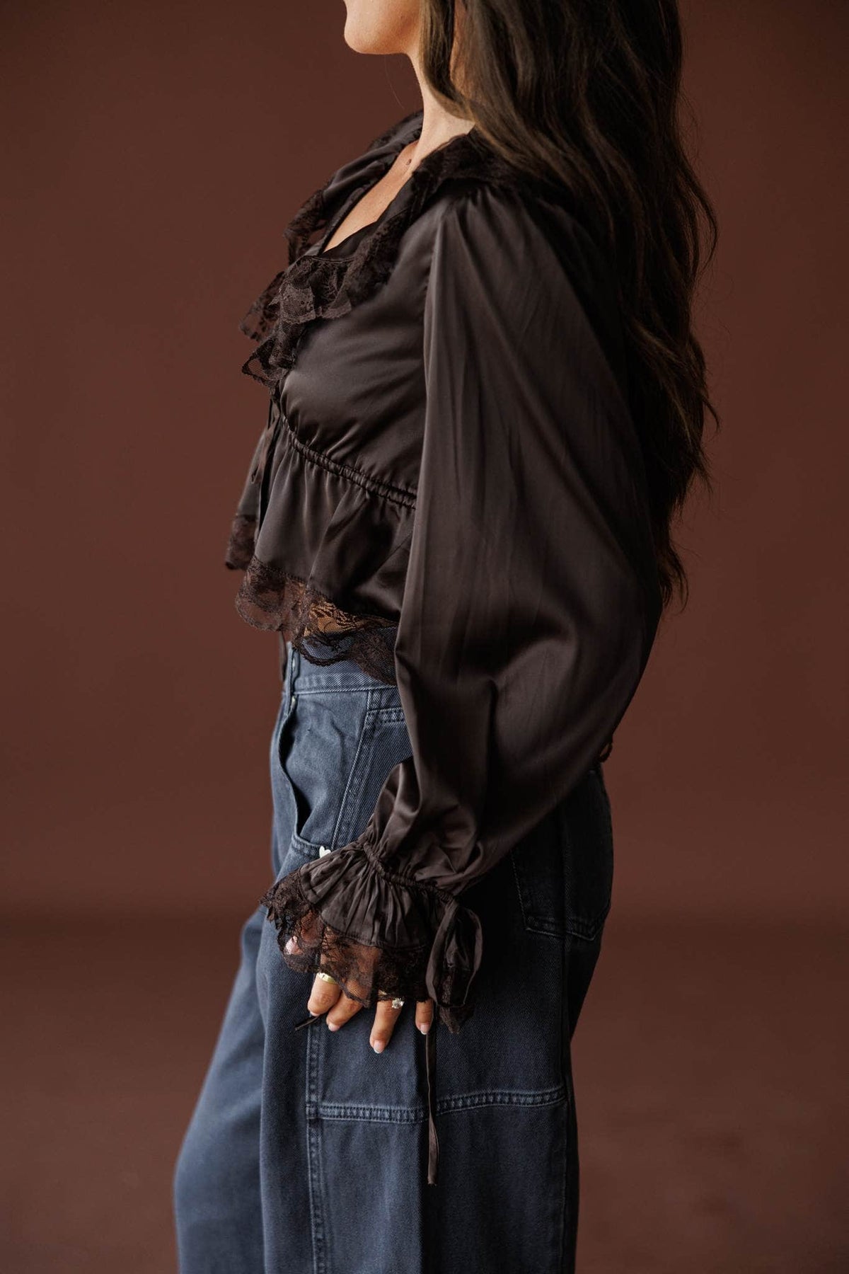 Ruffled Up Chiffon Blouse in brown, side view showing the tie cuff and ruffle trim