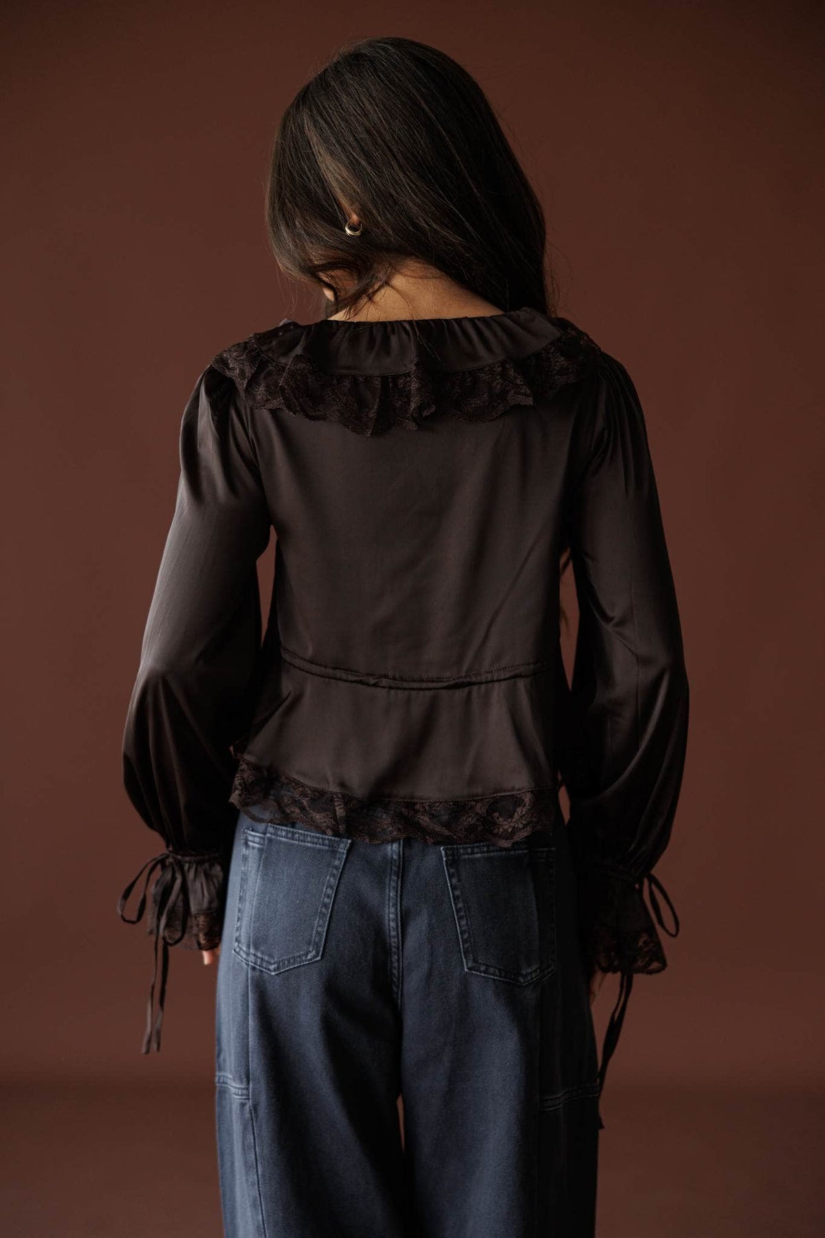 Ruffled Up Chiffon Blouse in brown, back view showing the sheer chiffon blouse