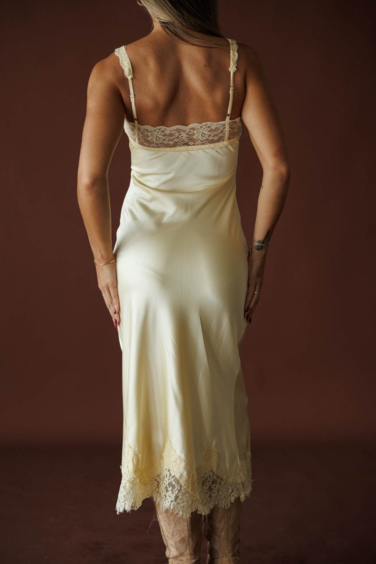 Buttermilk Lace Slip Dress in butter, back view showing the bias cut satin slip dress