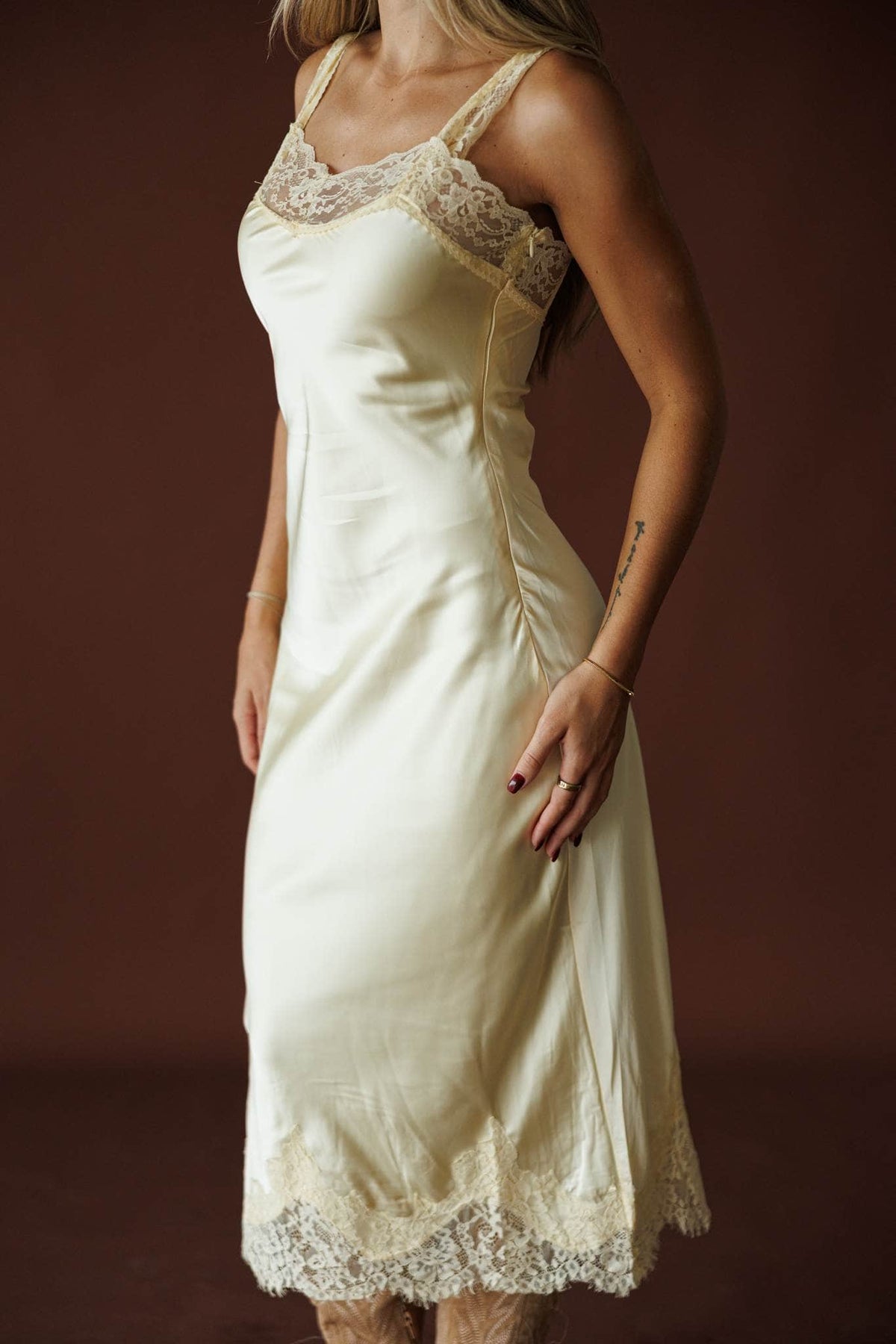 Buttermilk Lace Slip Dress in butter, front close-up of the lace bust and thin straps