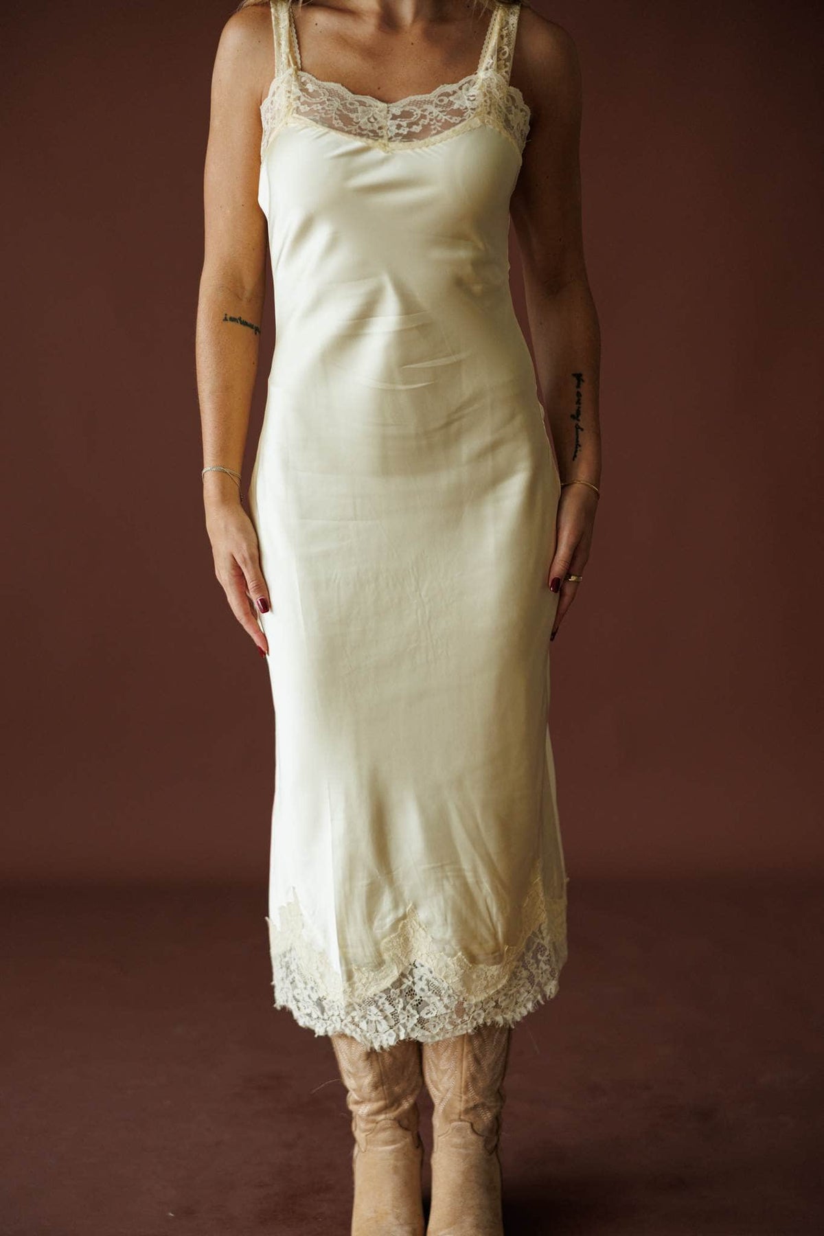 Buttermilk Lace Slip Dress in butter, front view showing the lace trim satin slip dress