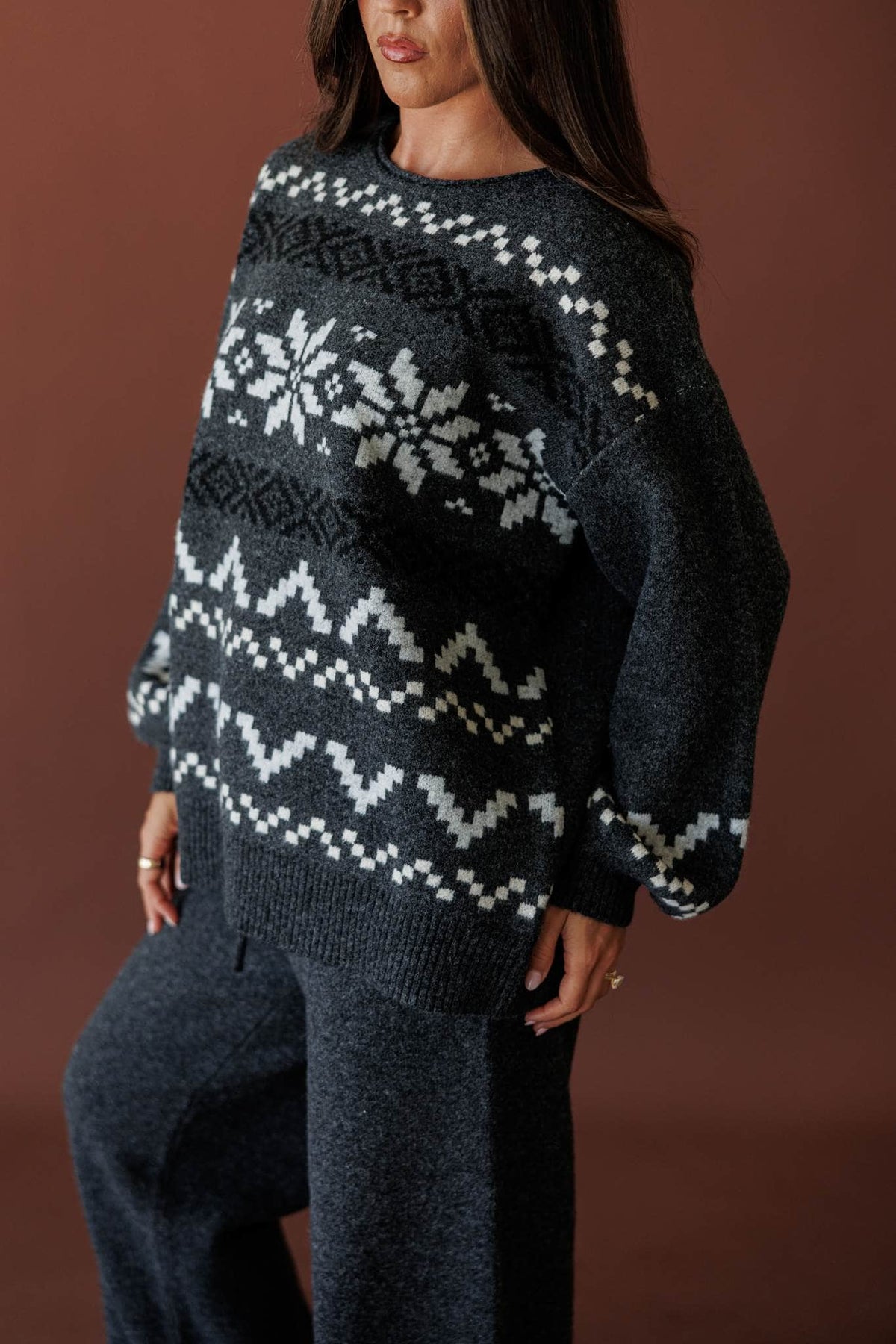Cabin Cozy Sweater, in charcoal, three-quarter view of the drop shoulder