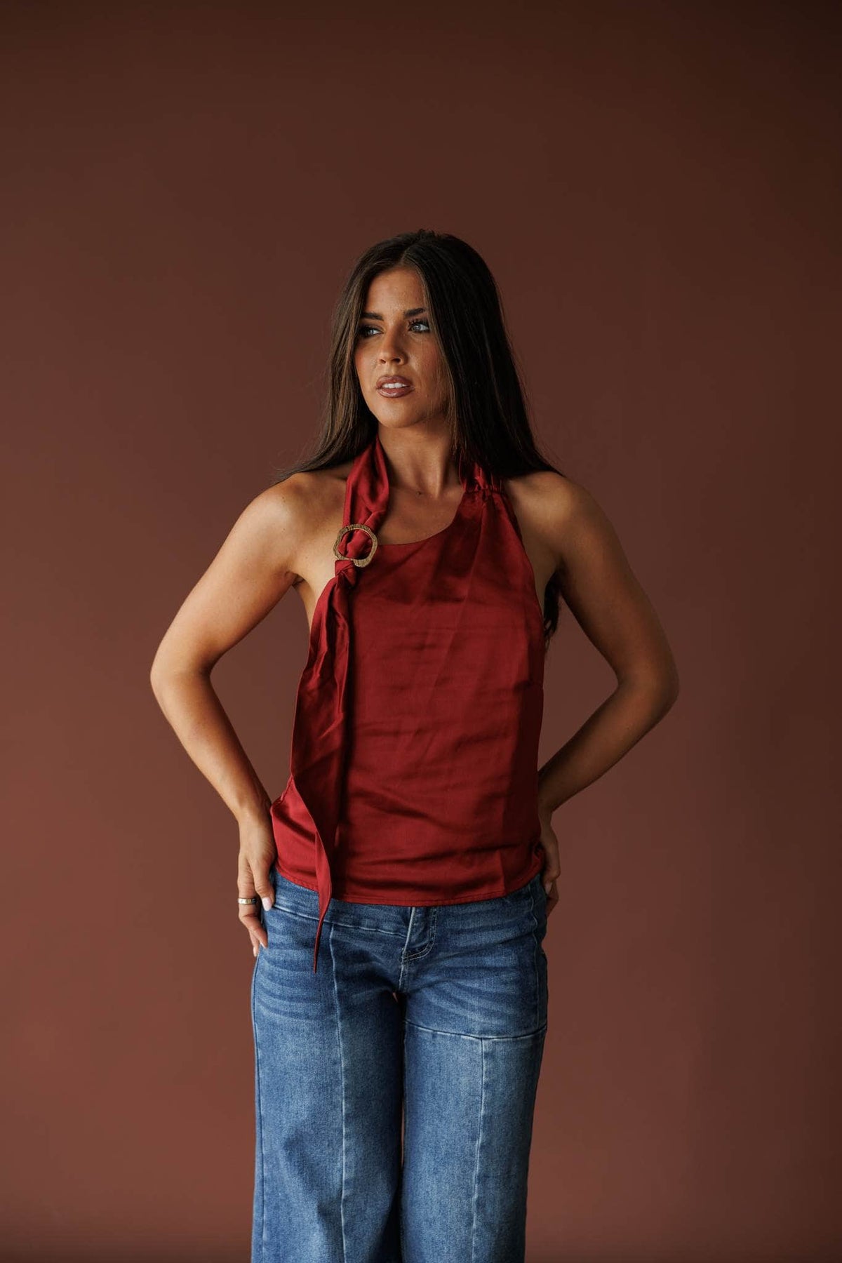Ivory satin halter top with a draped neckline