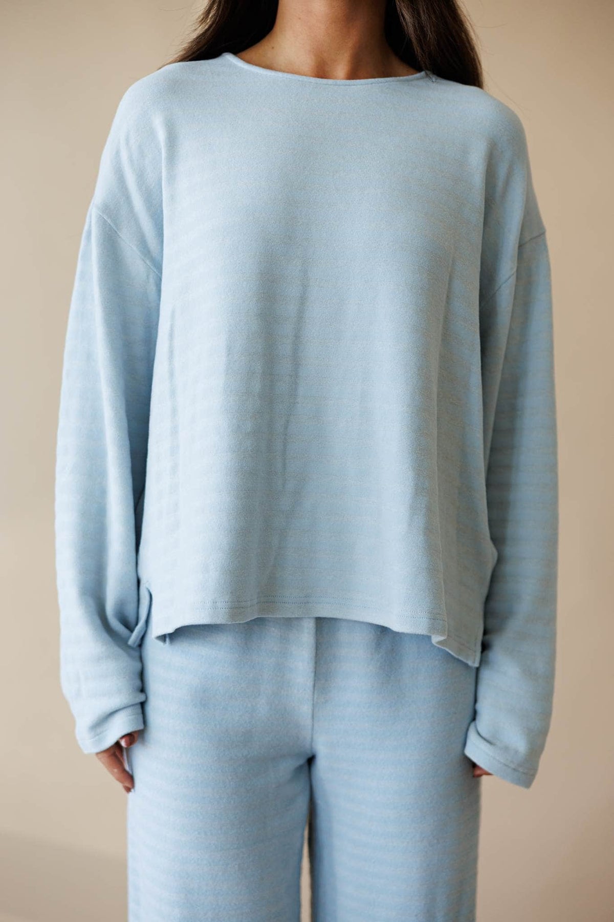 Pale blue ribbed knit long sleeve top