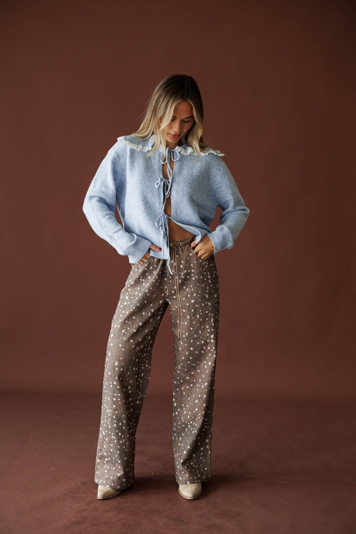 Bambi Wide Leg Pants in brown, full-length view with a light blue denim jacket