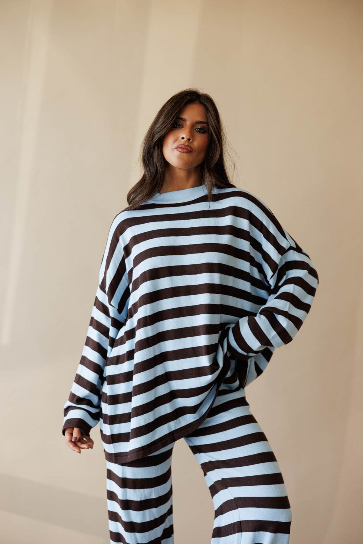 Pale blue and cocoa stripe oversized knit top, front view
