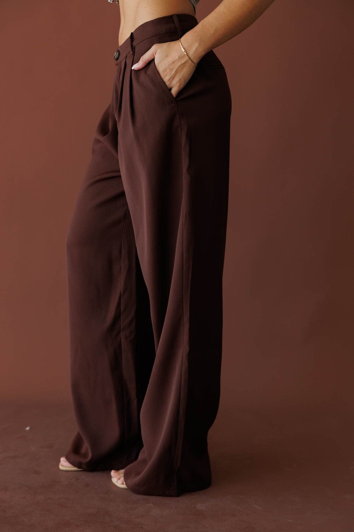 Dark brown pleated wide leg trousers