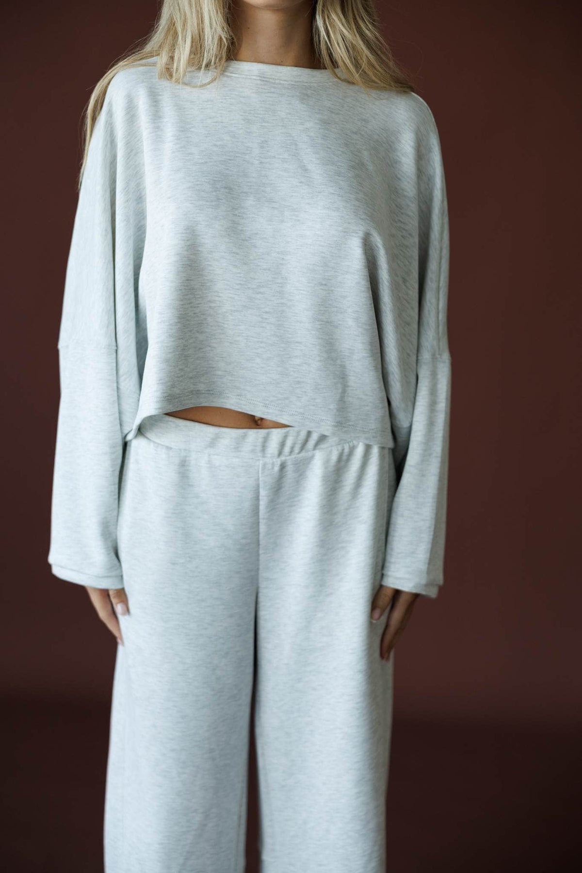 Cropped Scuba Dolman Top in ash grey, front close-up of the crew neck and dolman sleeves
