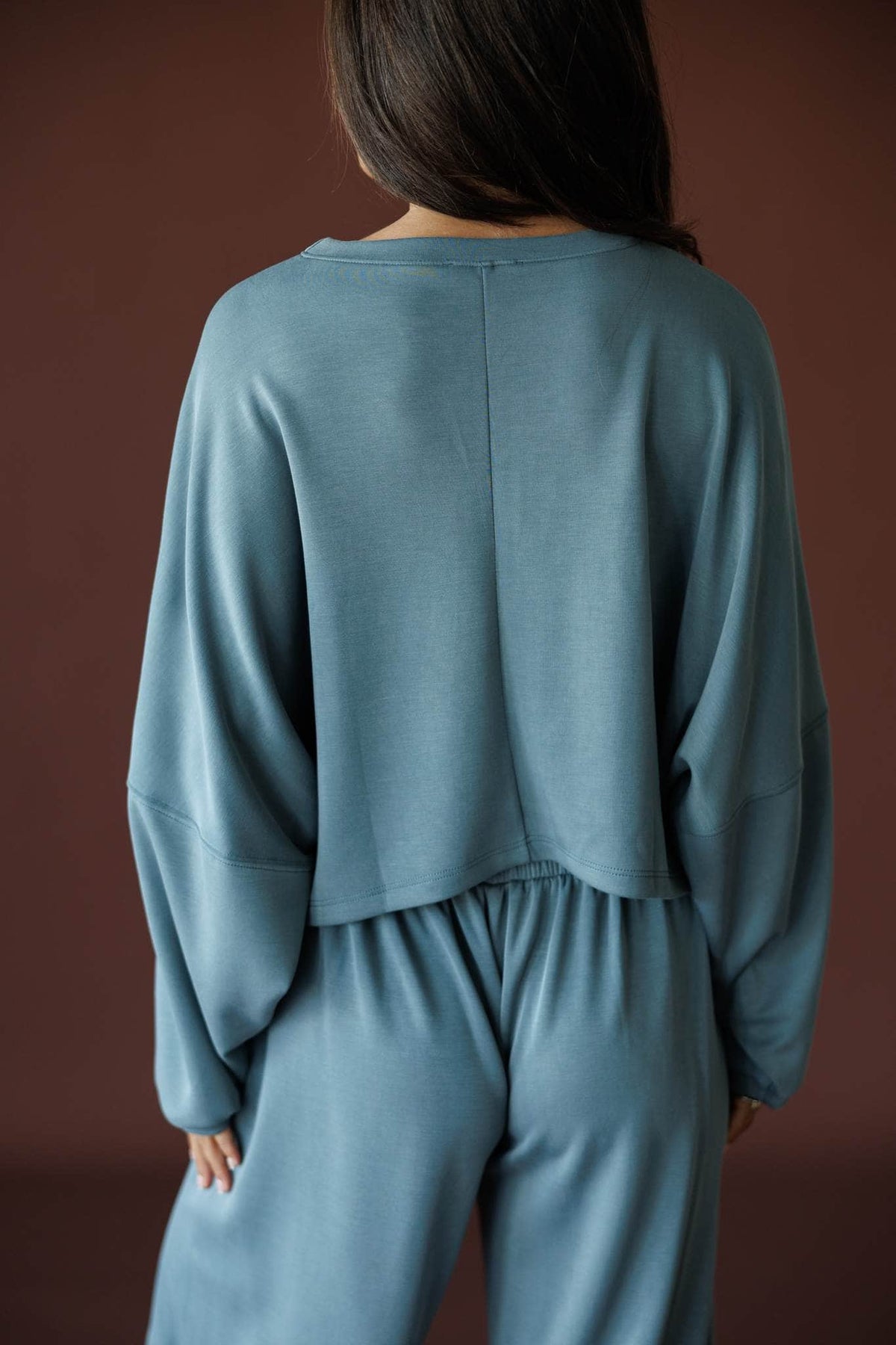 Cropped Scuba Dolman Top in charcoal, back view showing the boxy cropped scuba knit