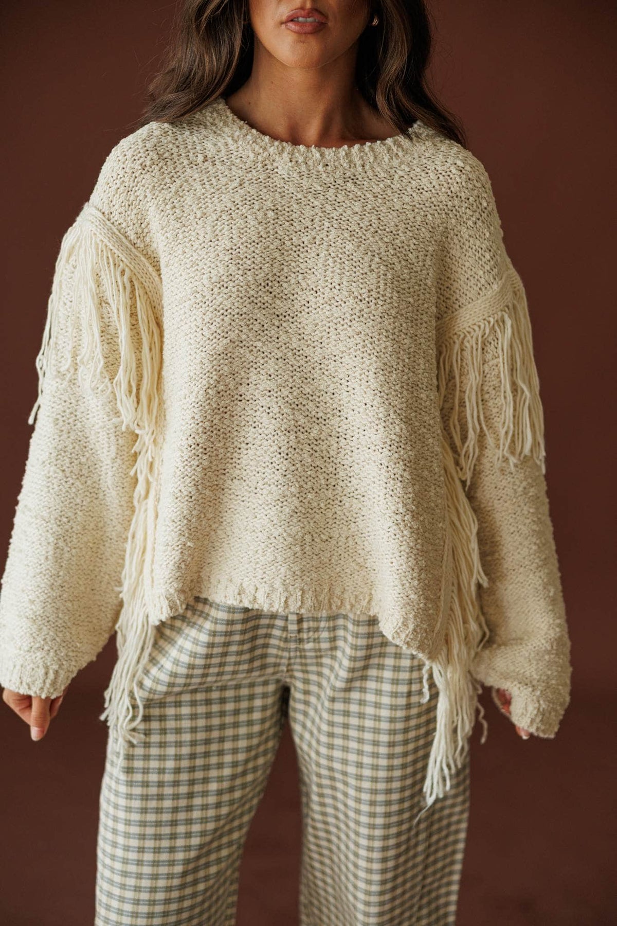 Cream Fringe Pullover Sweater, front view of the boucle knit and fringed sleeves