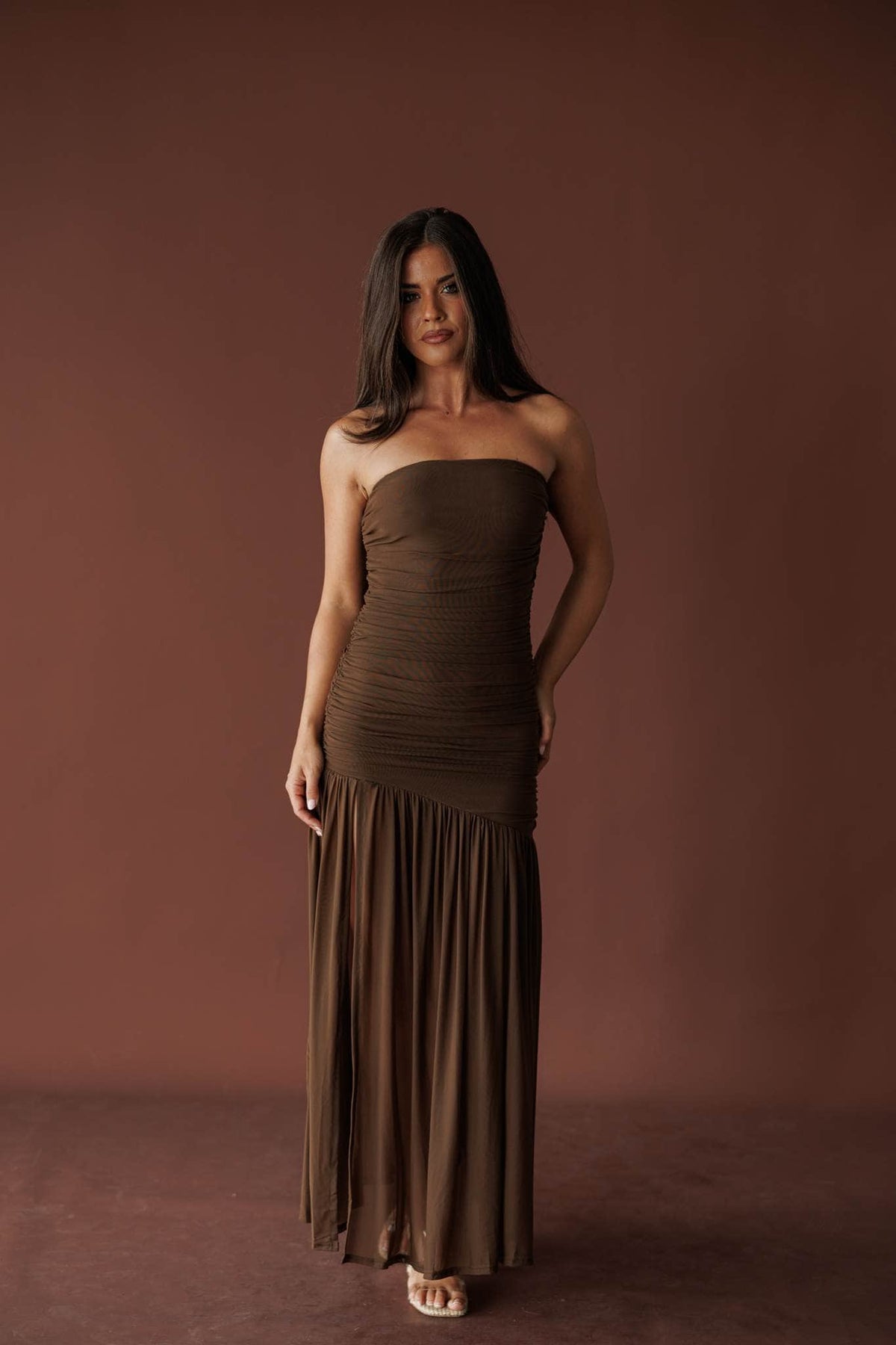 Full-length front view of the mocha strapless ruched maxi dress