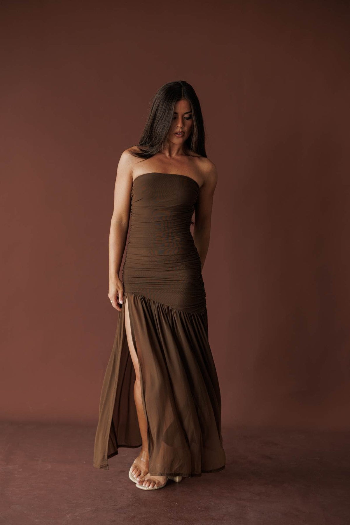 Full-length front view of the mocha maxi dress showing the high front slit