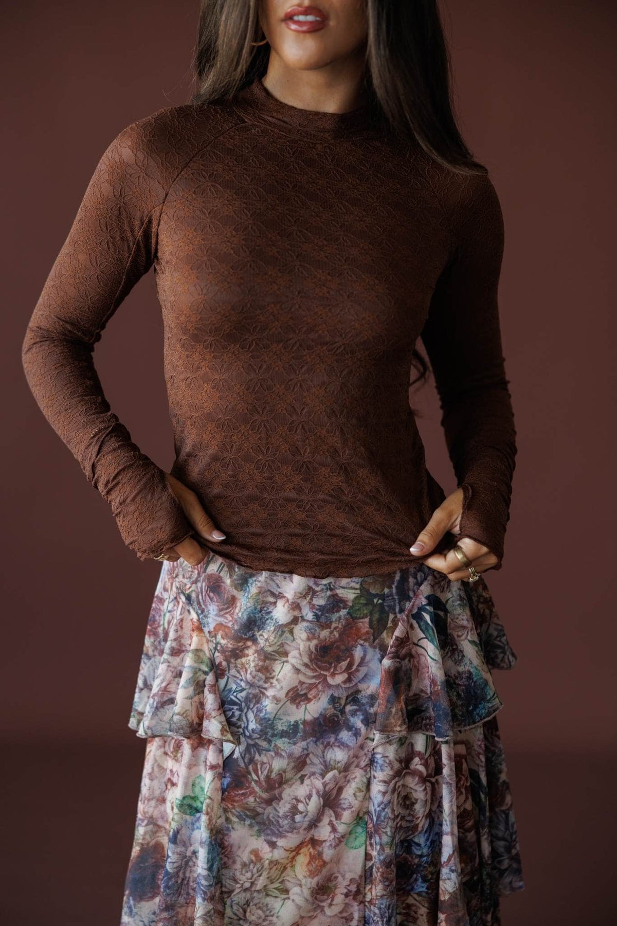 Delicate Matter Lace Top in chocolate, front close-up of the mock neck and textured lace