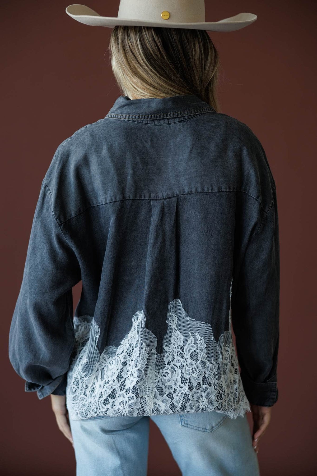 Denim And Delicate Top in black chambray, back view showing the lace trimmed chambray