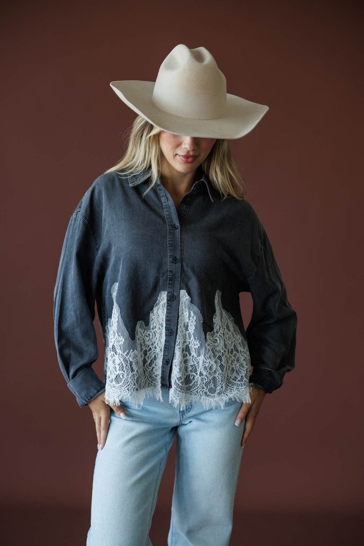 Denim And Delicate Top in black chambray, front view on model with a cream cowboy hat