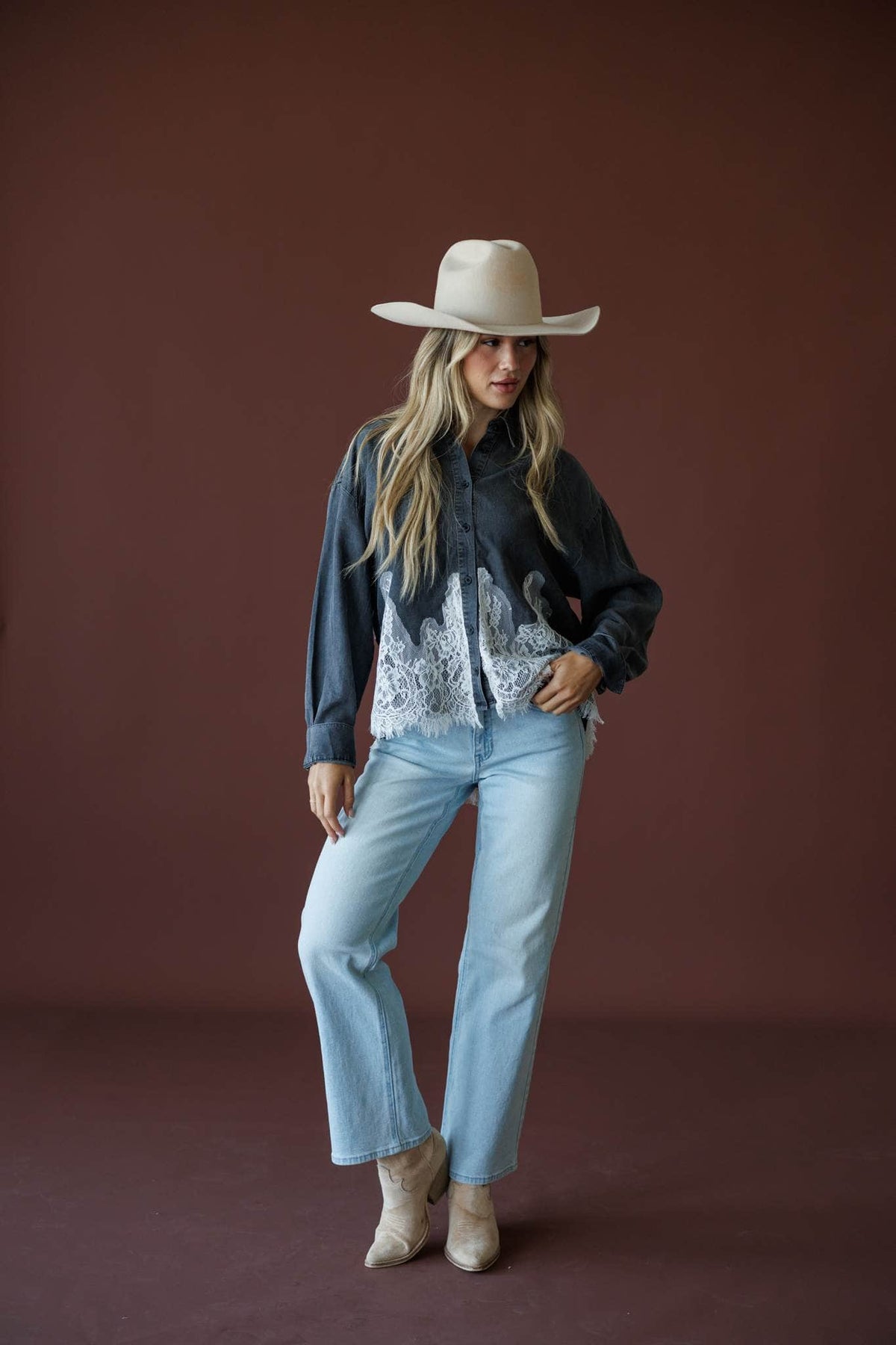 Denim And Delicate Top in black chambray, full-length view on model with hands in pockets