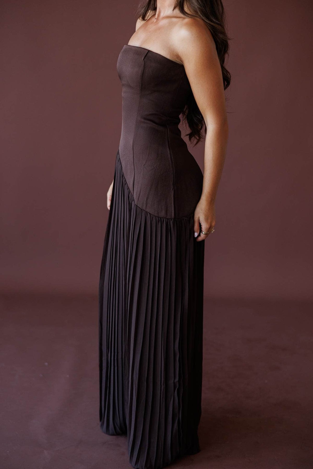 Cocoa Nights Strapless Maxi Dress, side view of the fitted bodice