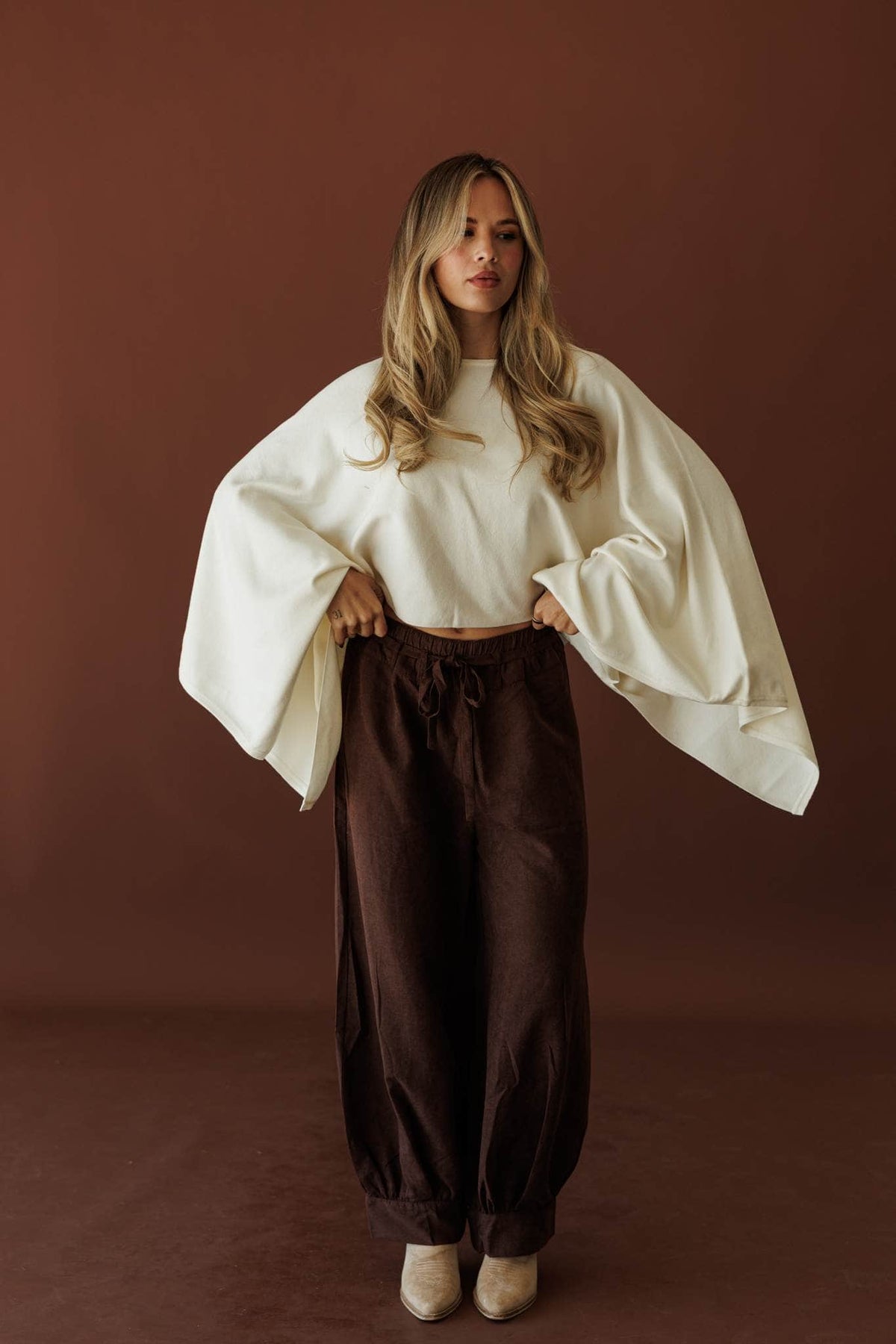 Cocoa Break Balloon Pants, full-length view with a cream top