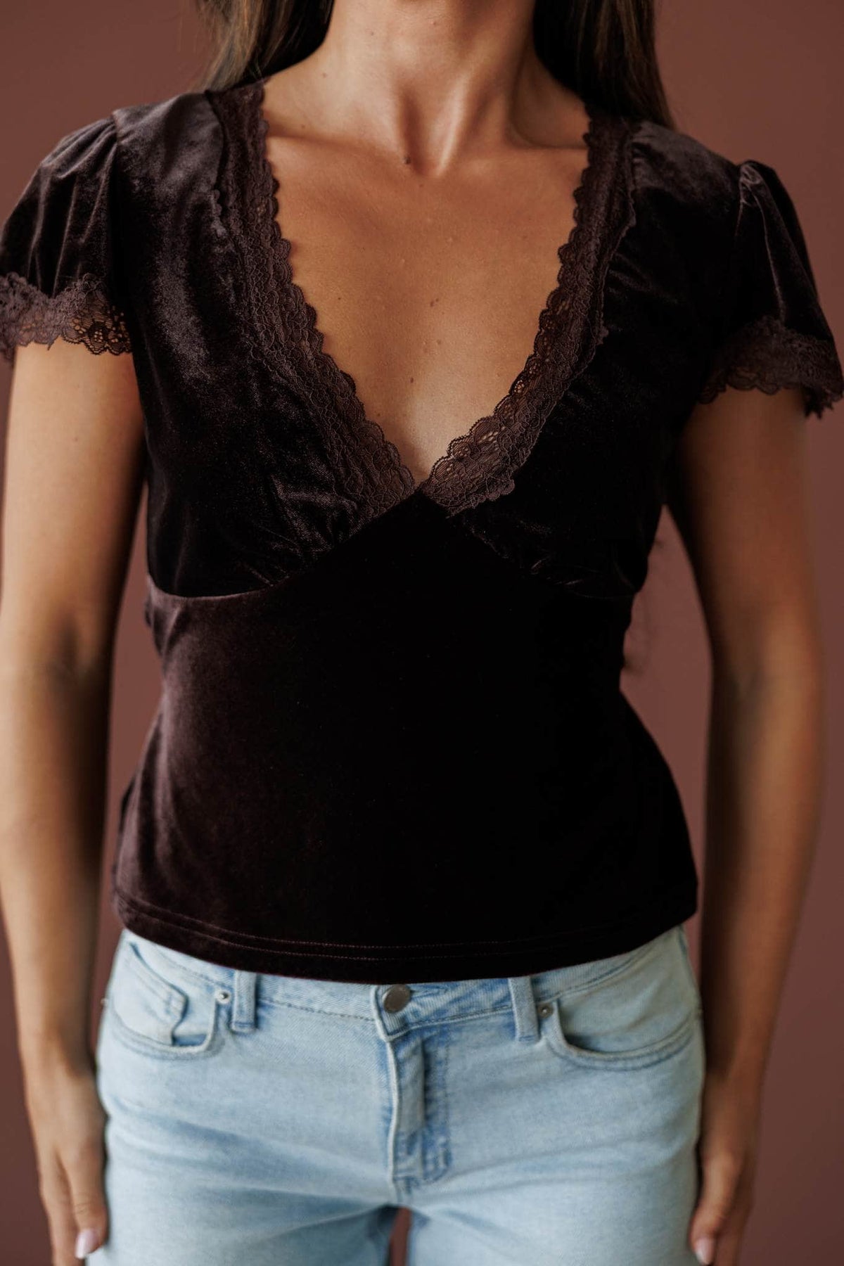 Dark Rum Velvet Lace Top, in dark rum, close front view of the lace sweetheart neckline