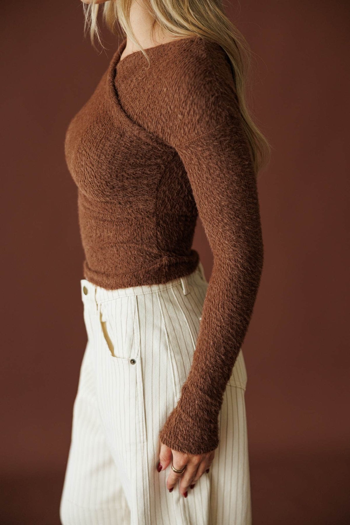 Feels Like Fall Sweater in chocolate, side view showing the long fitted sleeve