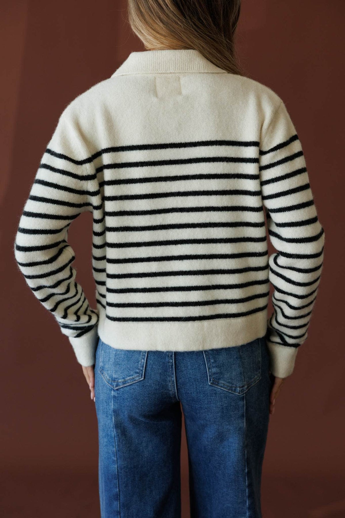 Cream and black sweater jacket