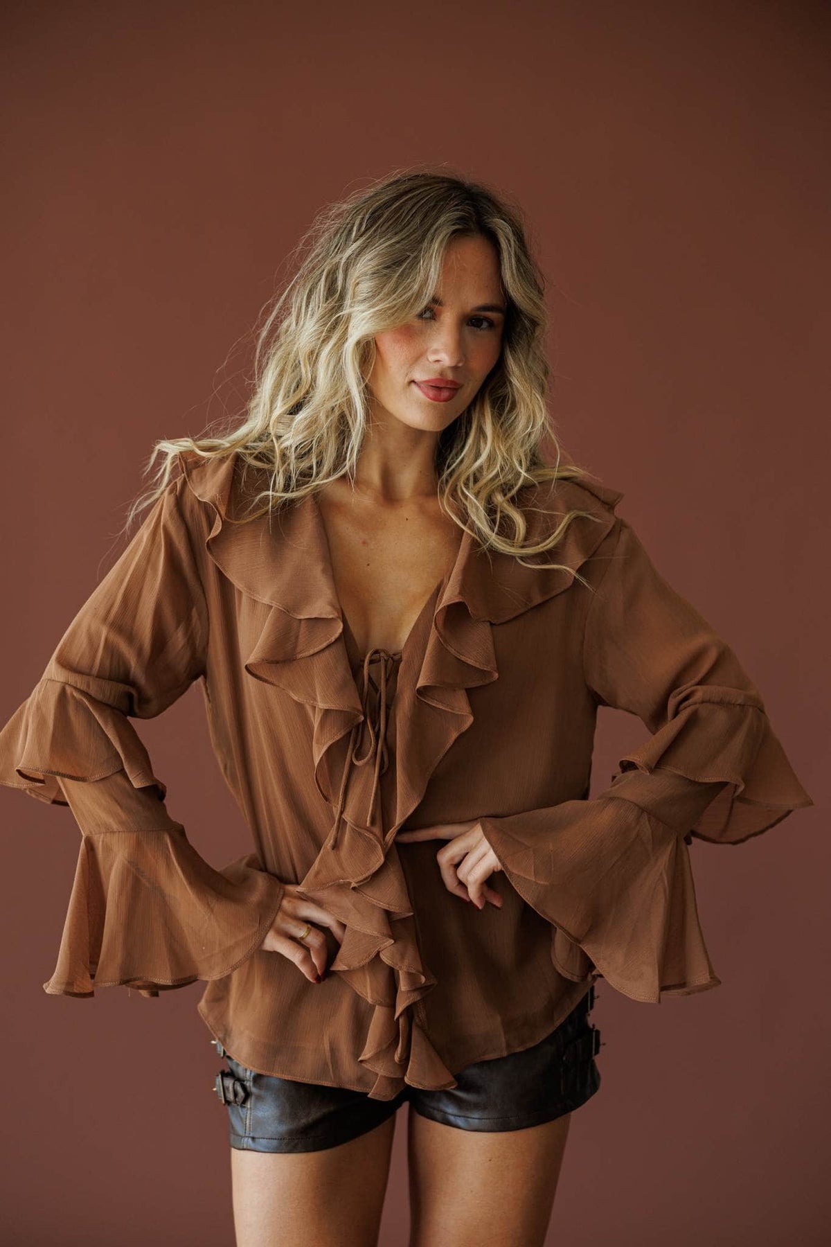 Heirloom Ruffle Blouse in chocolate, front view showing the ruffle placket and tie front