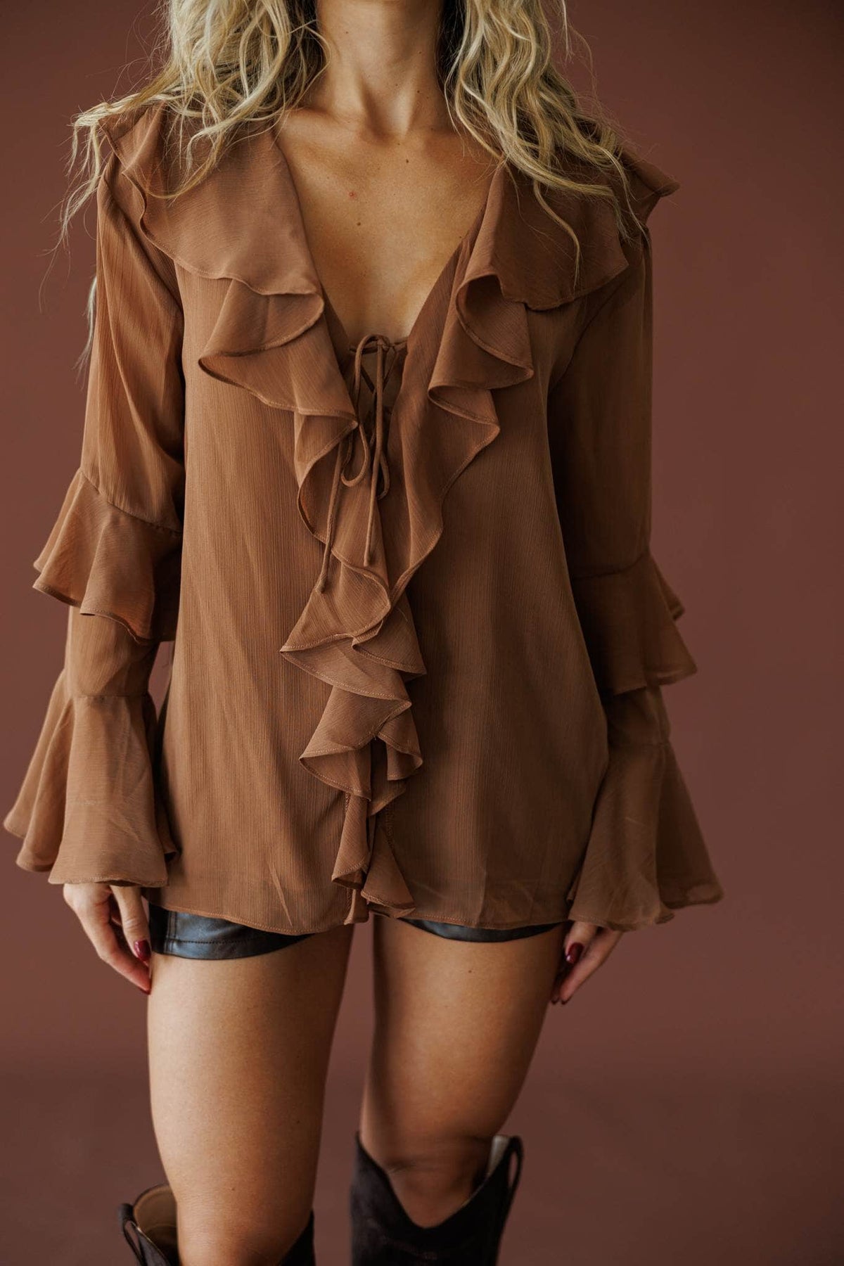 Heirloom Ruffle Blouse in chocolate, front close-up of the ruffle placket and V neck