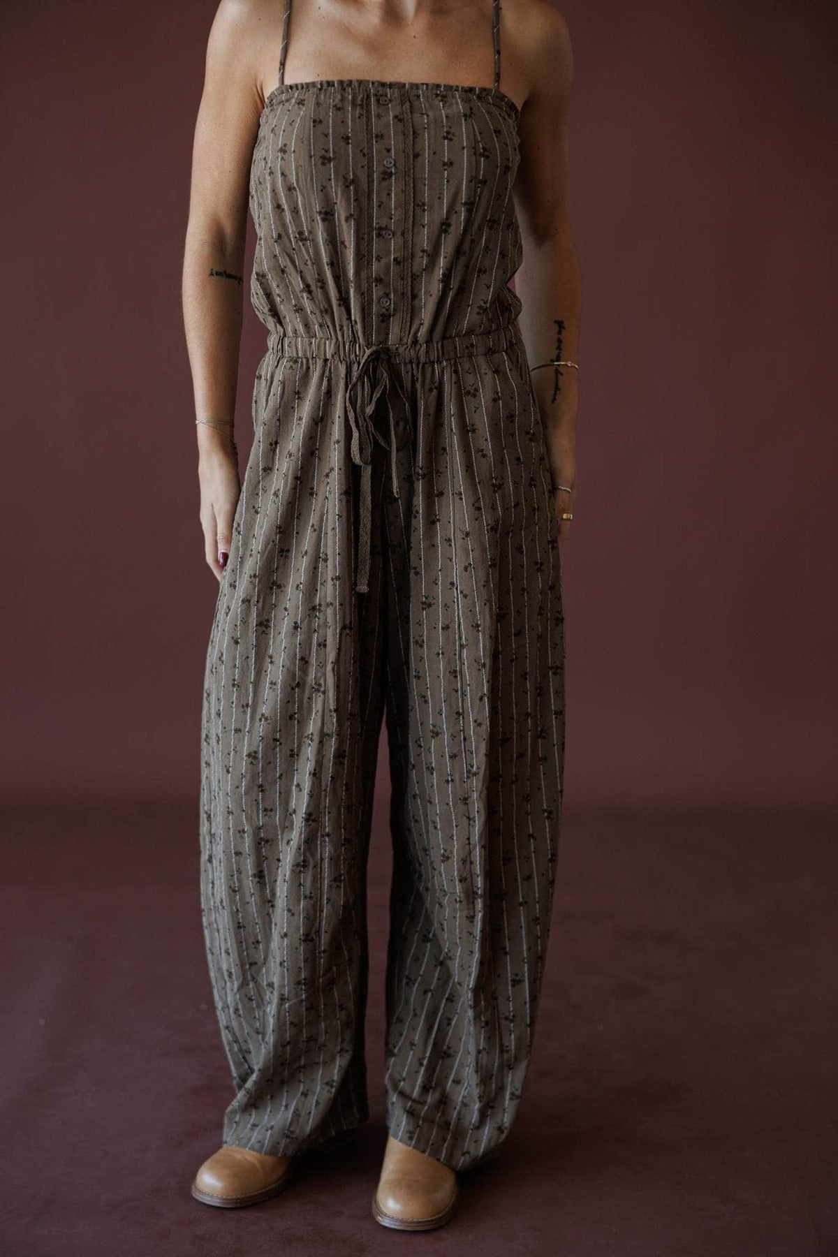 Garden Social Barrel Jumpsuit, in dark brown, close view of the textured floral fabric