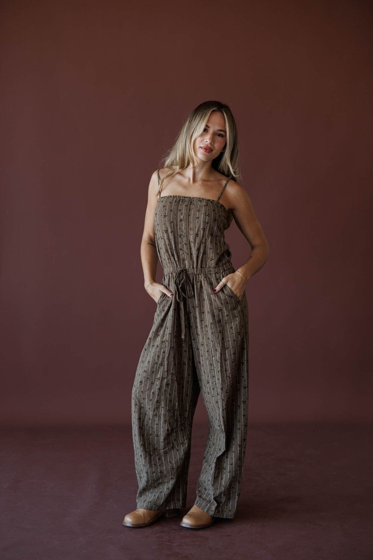 Garden Social Barrel Jumpsuit, in dark brown, close front view of the strapless neckline