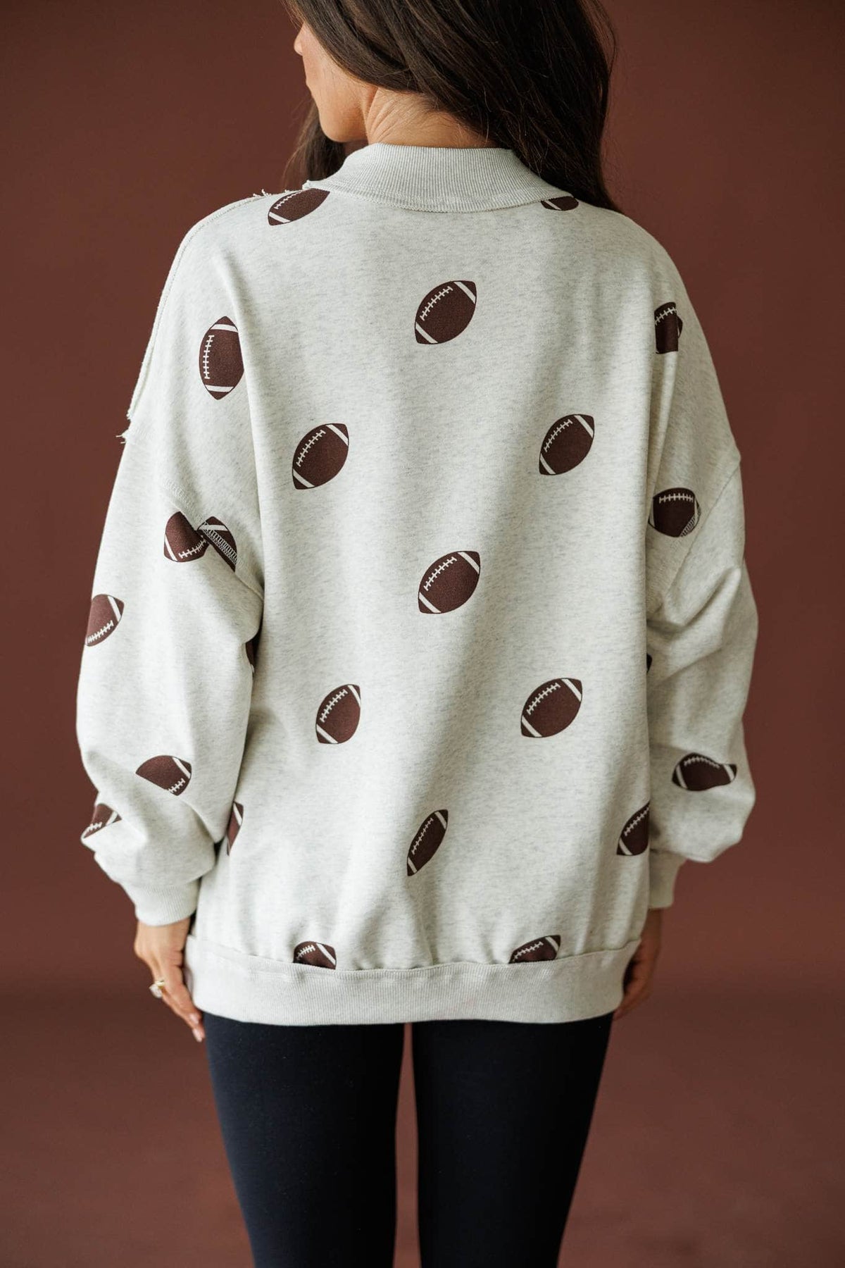 Double Down Reversible Sweatshirt in heather grey, back view of the all over football print side