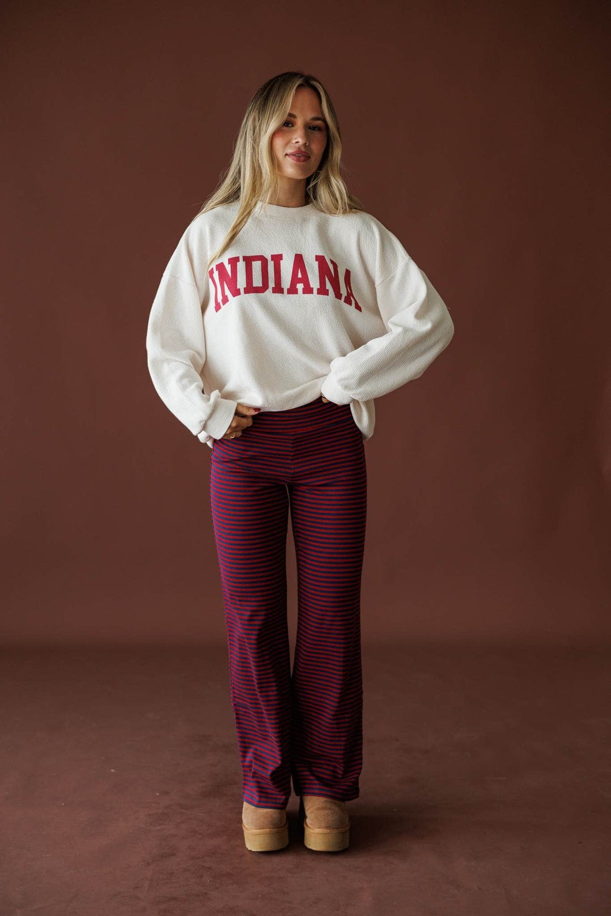 Indiana Cloud Knit Sweatshirt in ivory, front view on model with hands at the sides