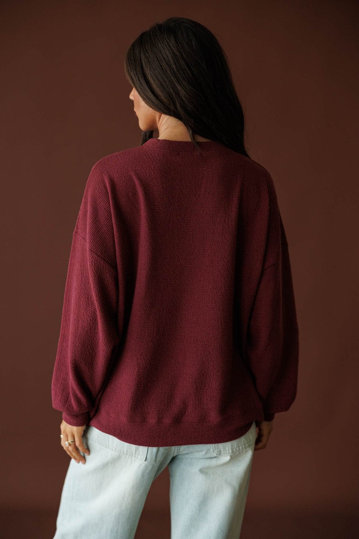 Indiana Cloud Knit Sweatshirt in wine, back view showing the oversized sweatshirt