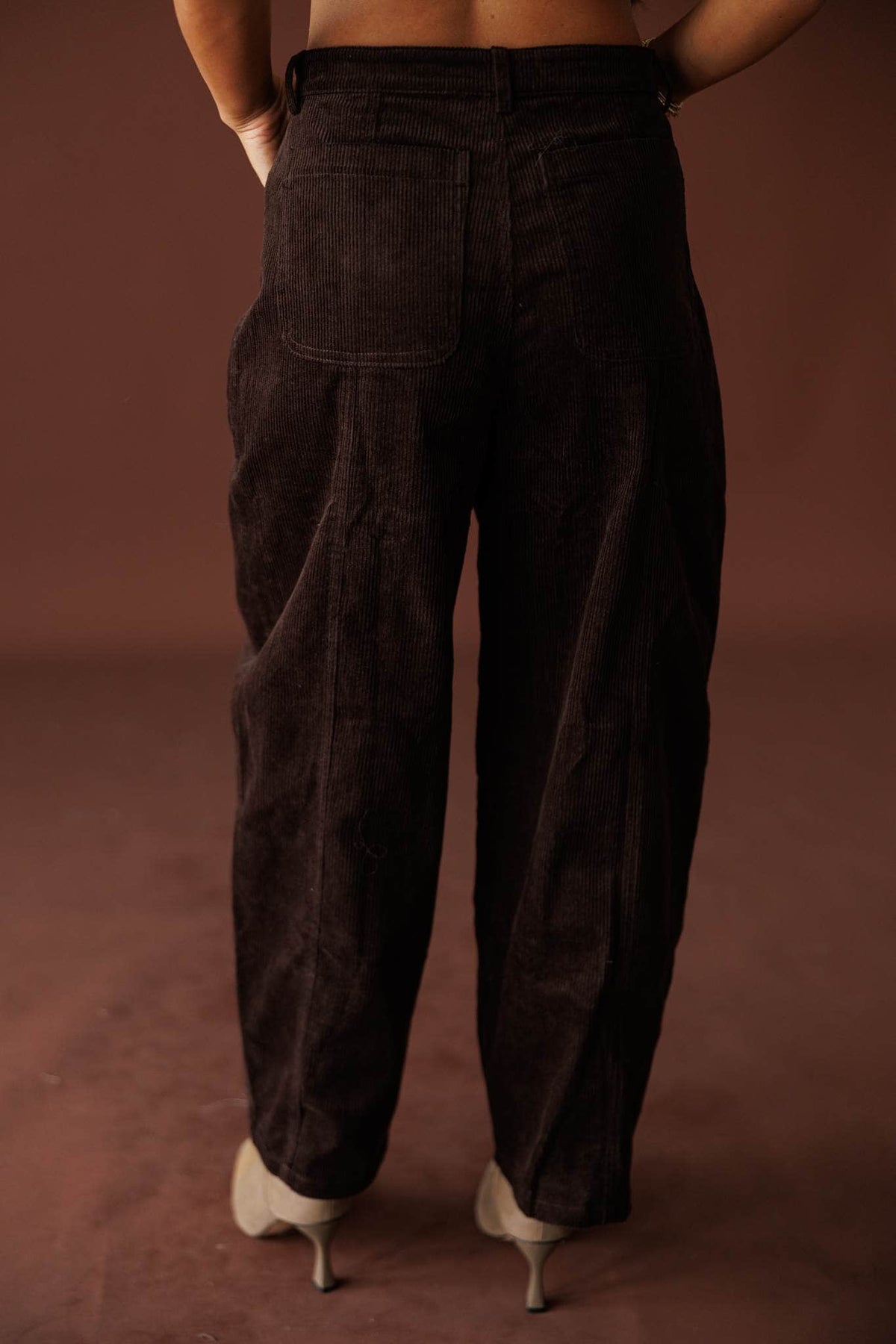 Bookshop Corduroy Barrel Pants in dark chocolate, front view showing the curved barrel leg