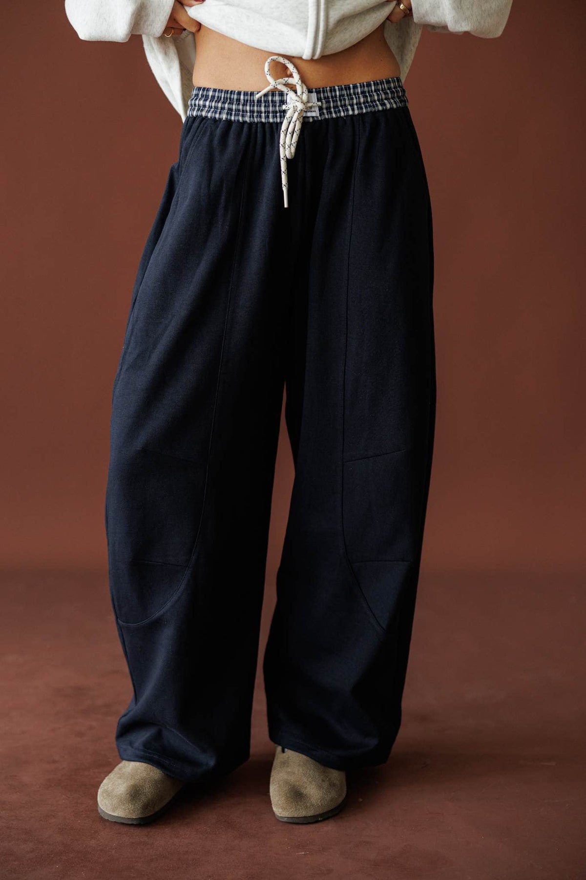 Slow Down Wide Leg Joggers in navy, front view of the contrast drawcord waistband