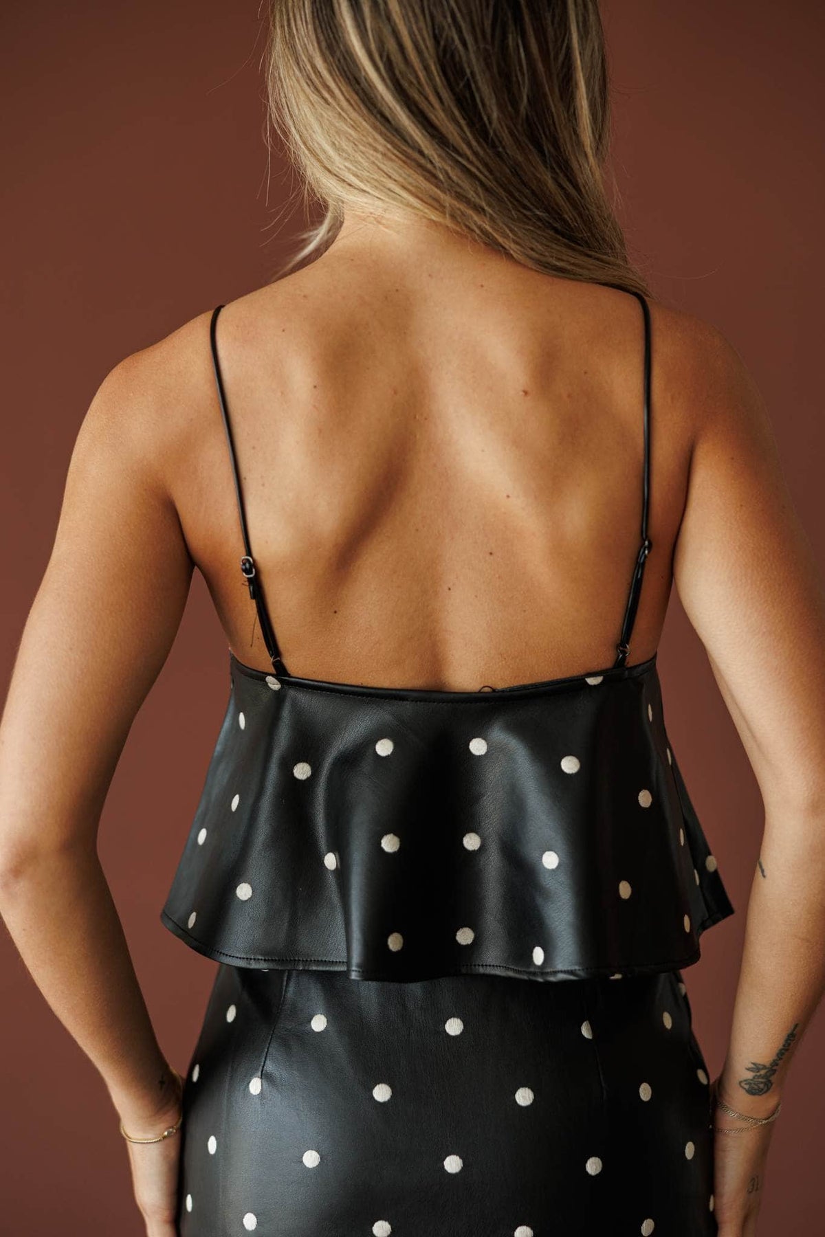Black faux leather cami with pearl studs