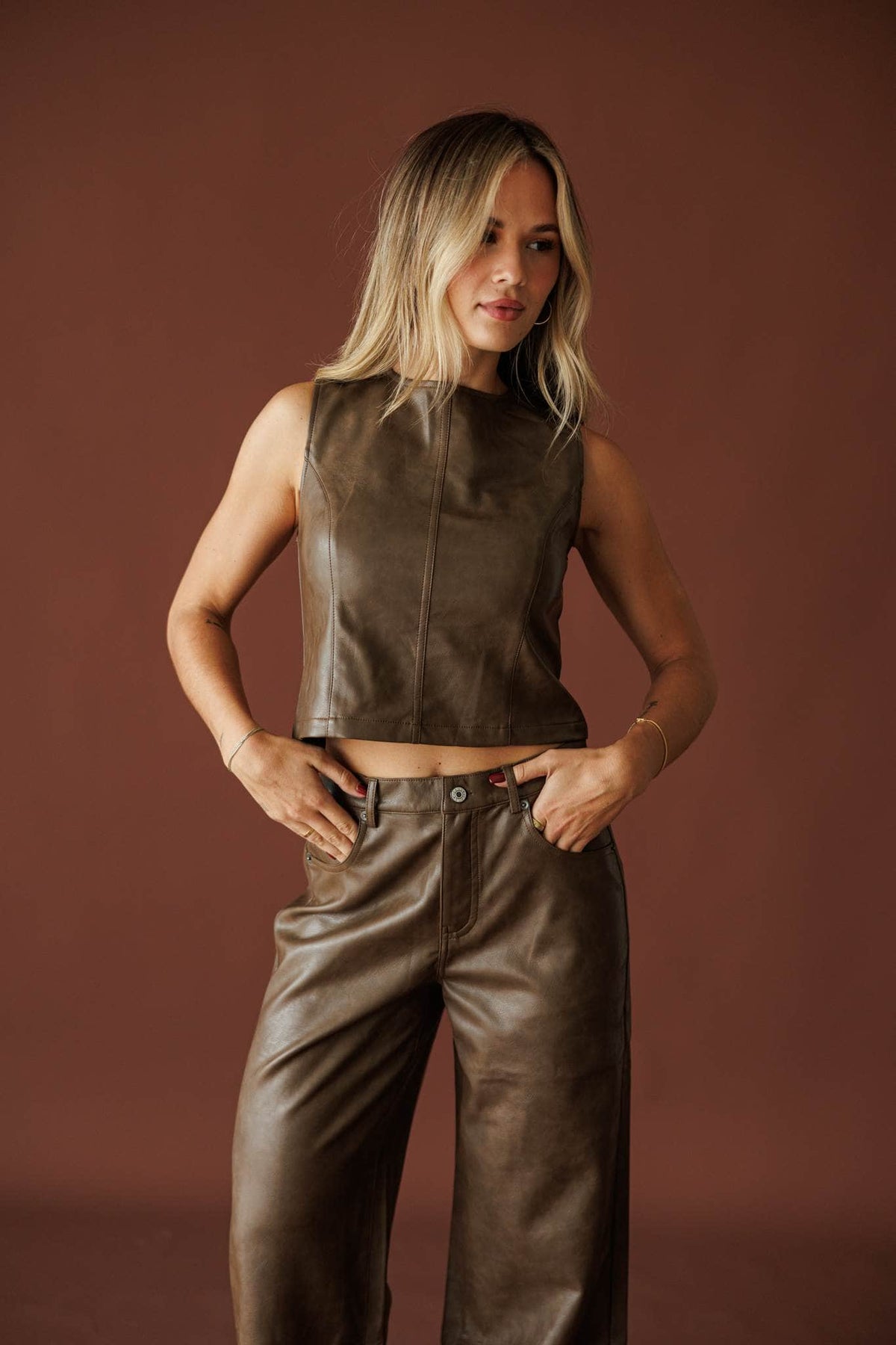 Trouble Tonight Leather Top in brown, front view worn with the matching faux leather pants