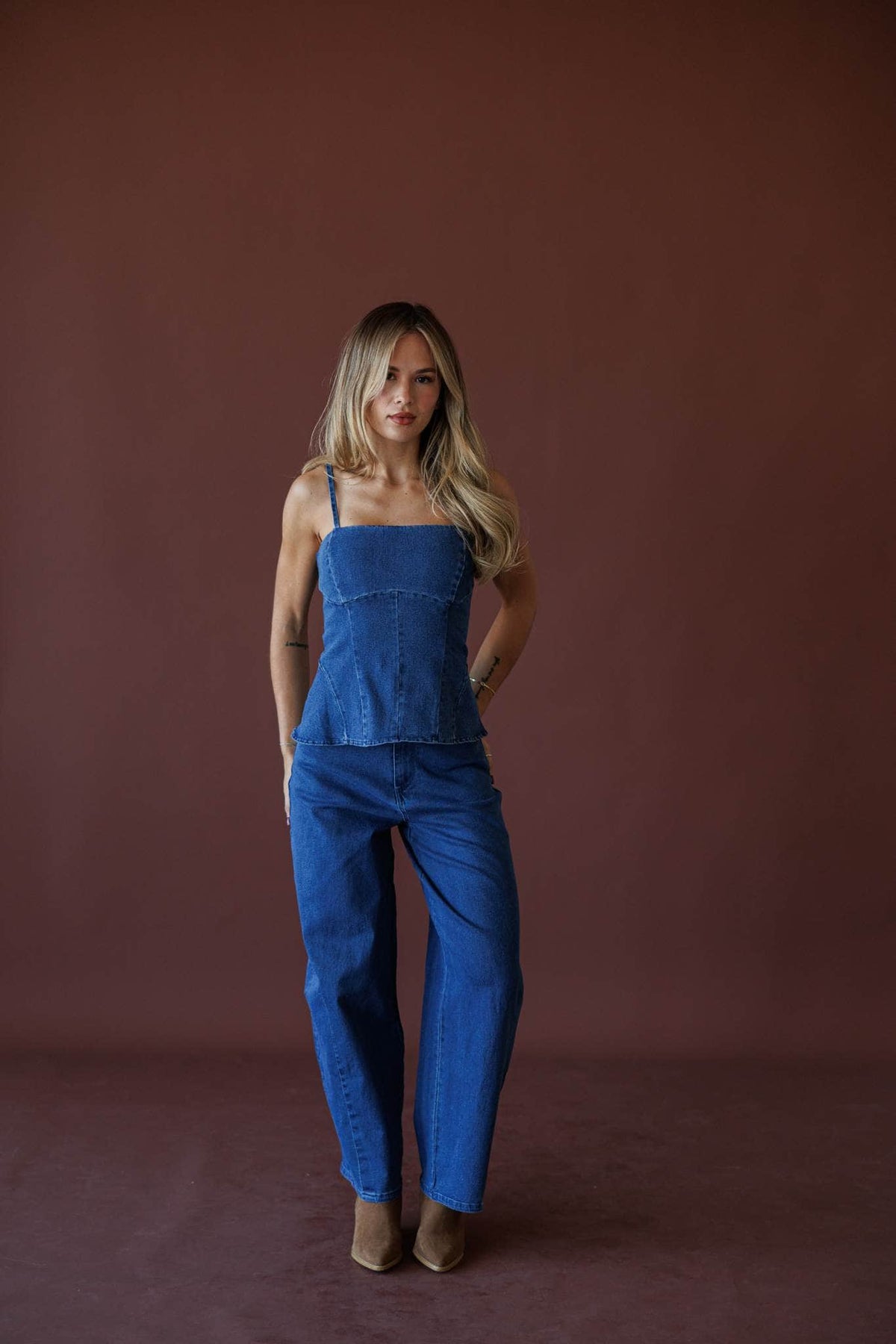 True Blue Barrel Jeans, in dark denim, full-length front view with a denim bustier