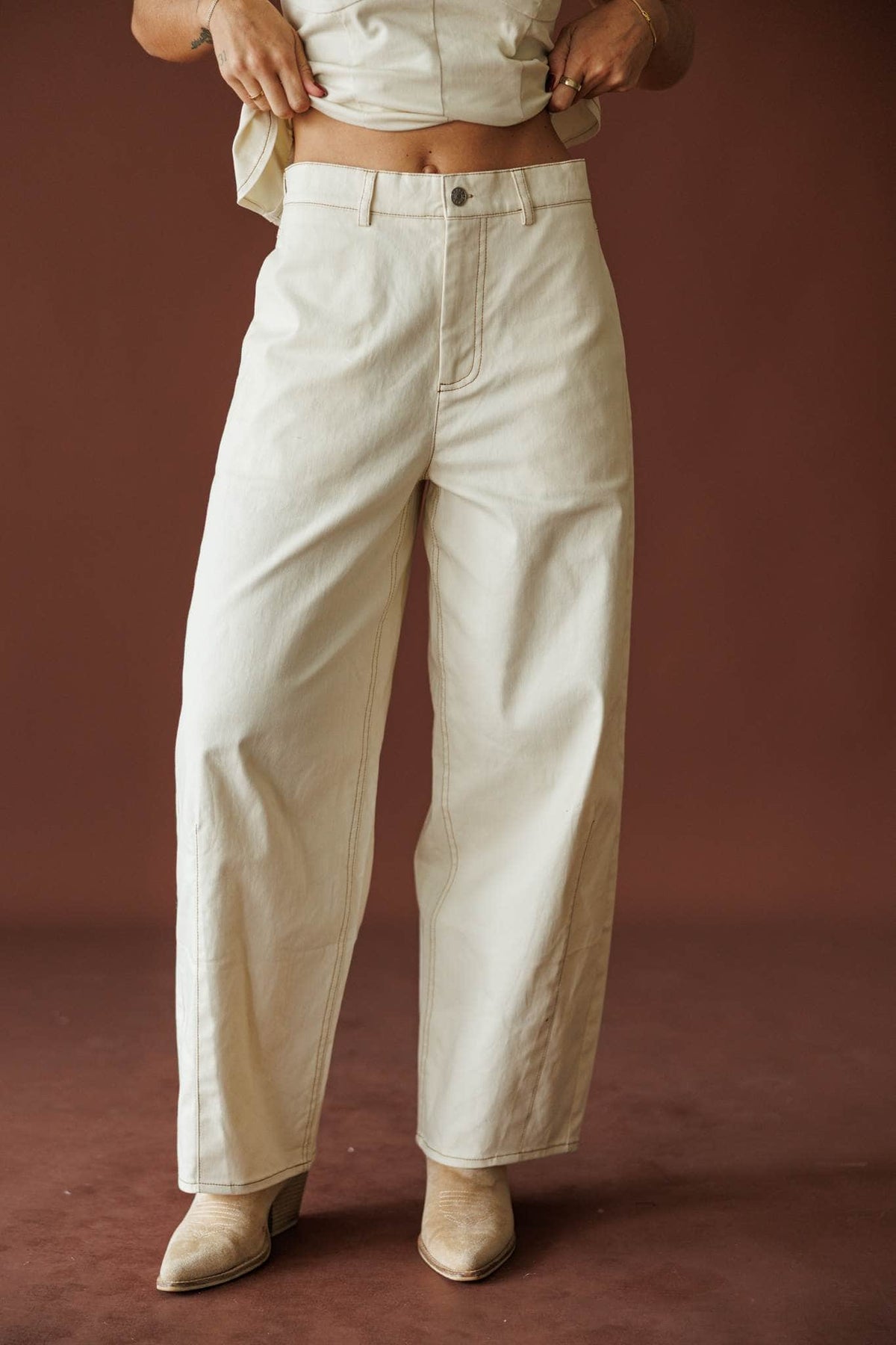 Roadhouse Barrel Pants in cream, front view of the barrel leg with booties